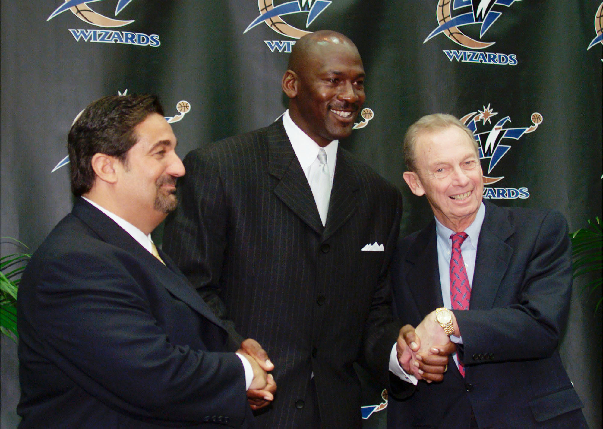 Michael Jordan (center) welcomed as a new member of the Washington Wizards front office in January 2000