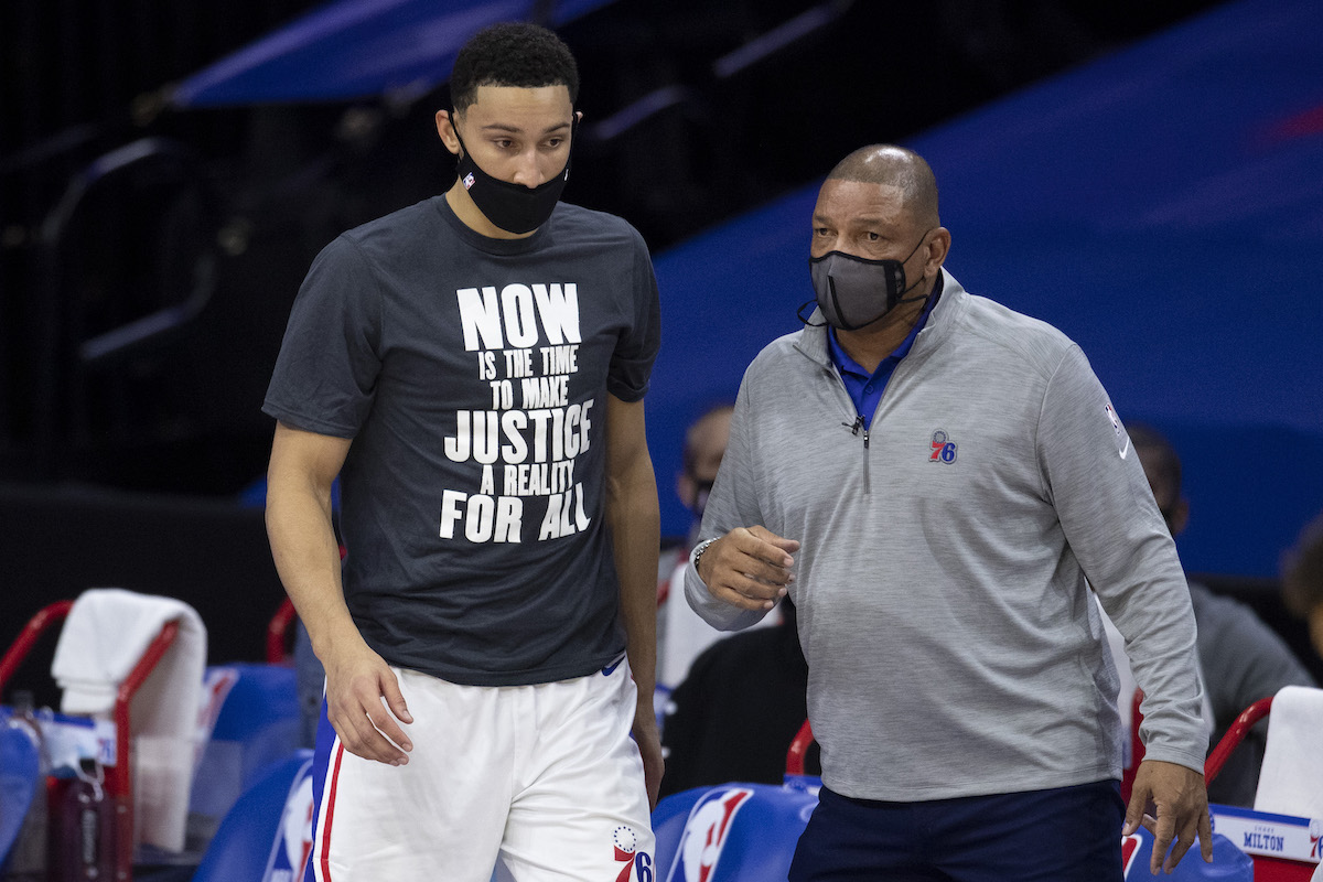 Doc Rivers and Ben Simmons converse while the latter was still a member of the Philadelphia 76ers