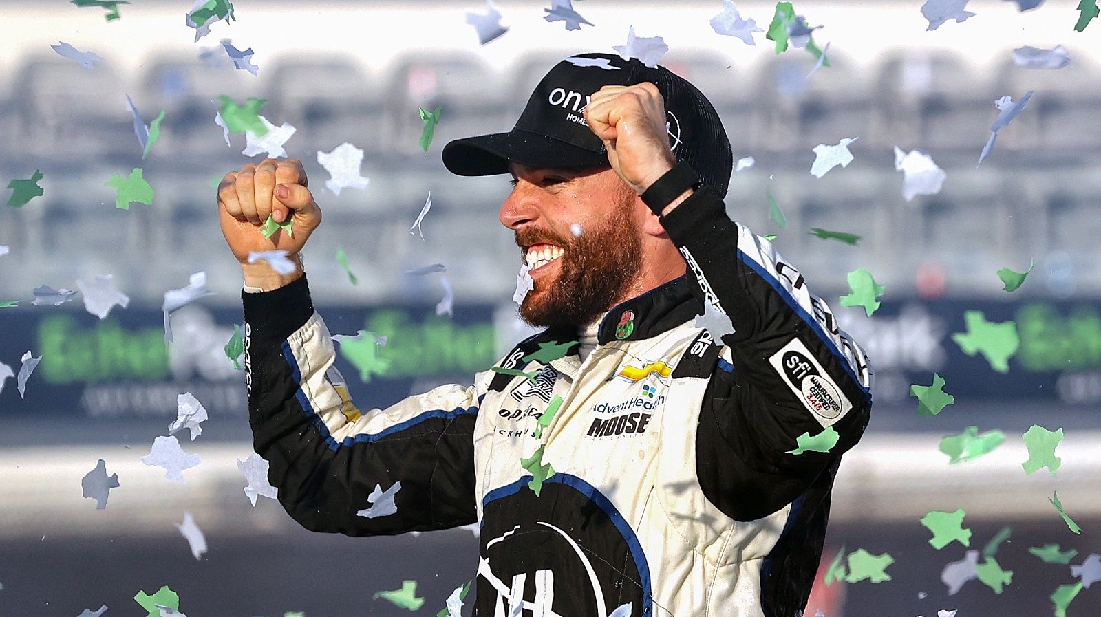 Ross Chastain, driver of the No. 1 Chevrolet, celebrates in Victory Lane after winning the NASCAR Cup Series EchoPark Automotive Grand Prix at Circuit of The Americas on March 27, 2022.