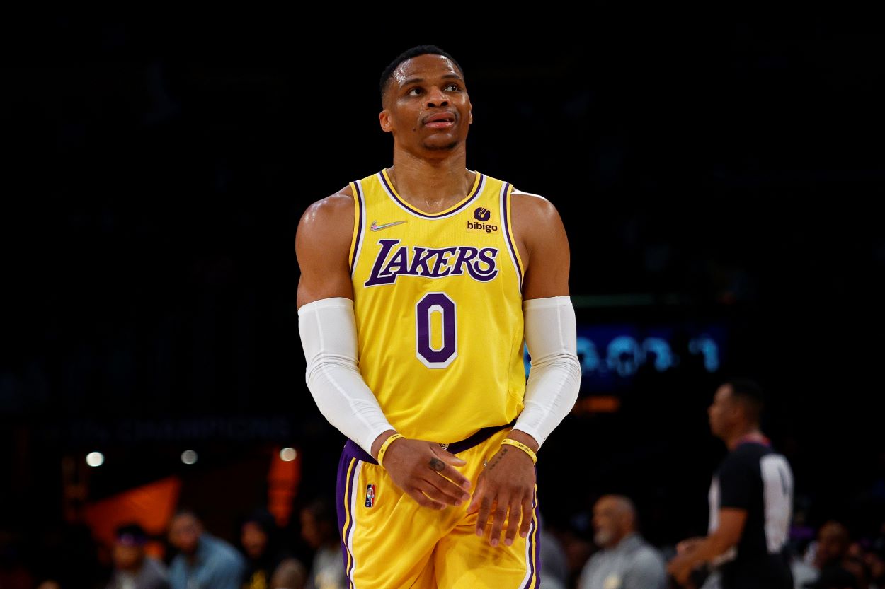 Lakers point guard Russell Westbrook reactst to a play during a game.