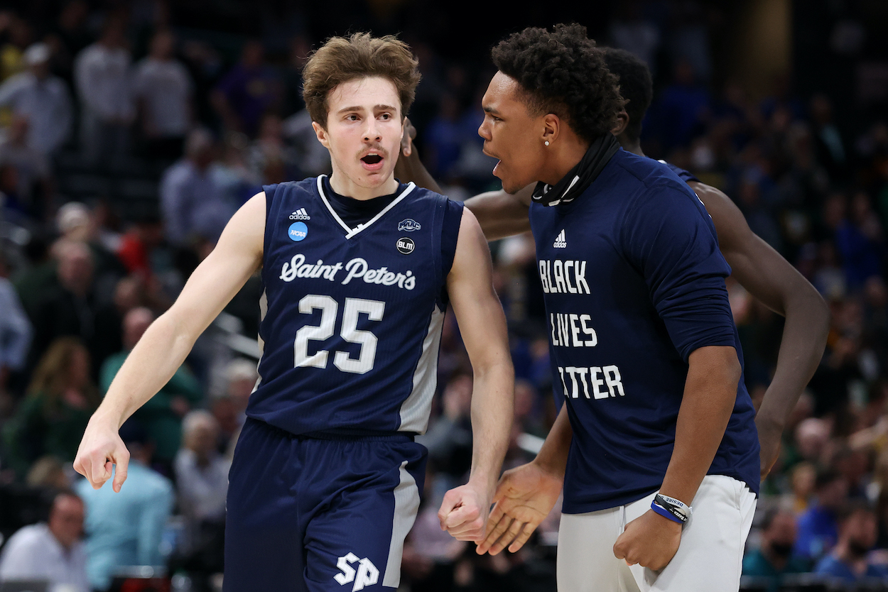 Doug Edert of the Saint Peter's Peacocks celebrates against Kentucky.