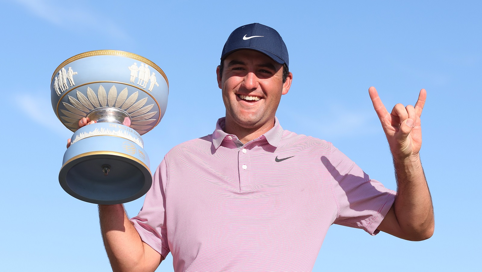 Scottie Scheffler poses with the Walter Hagen Cup after defeating Kevin Kisner in their finals match to win the World Golf Championships-Dell Technologies Match Play at Austin Country Club on March 27, 2022.