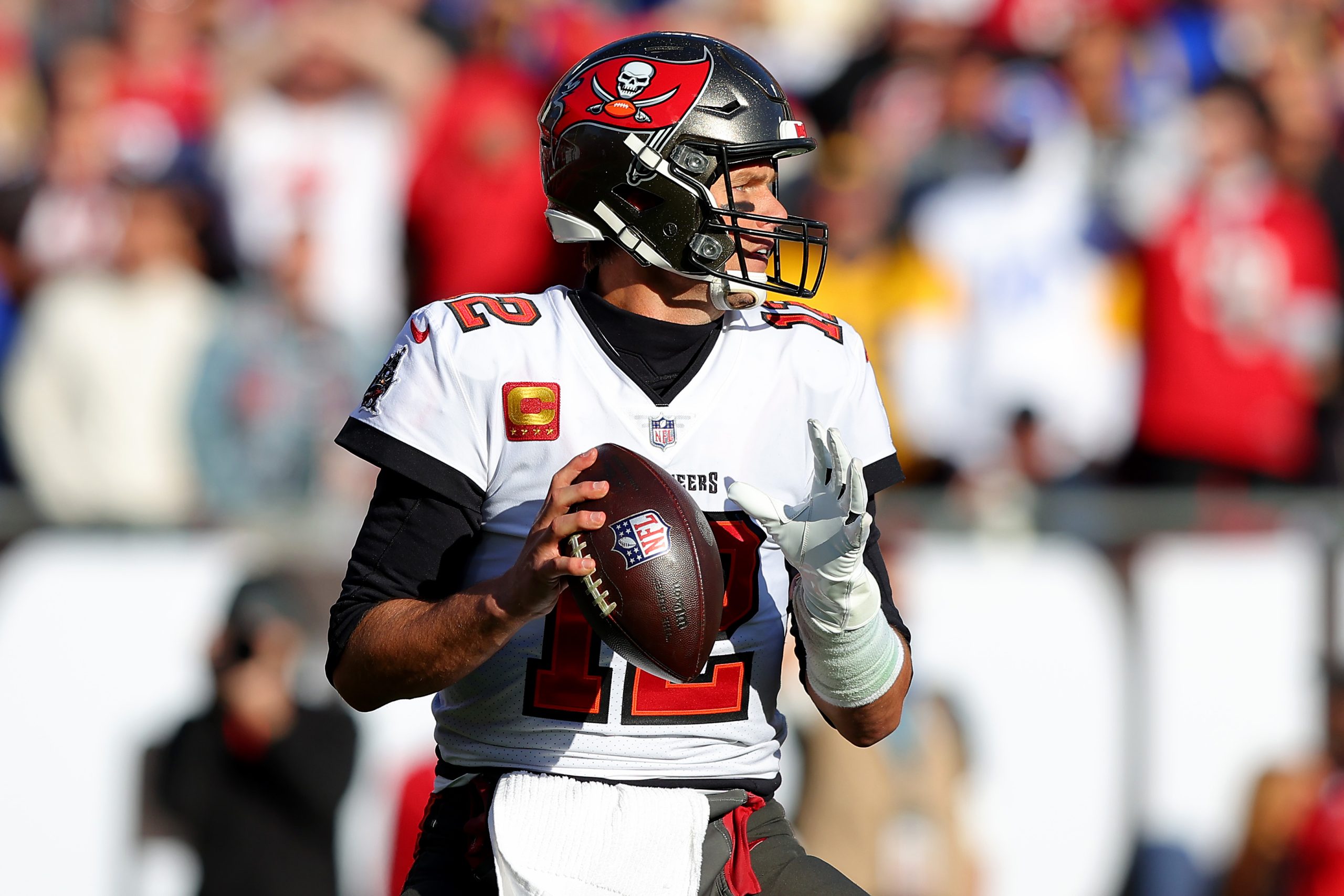 Tom Brady of the Tampa Bay Buccaneers looks to throw the ball.