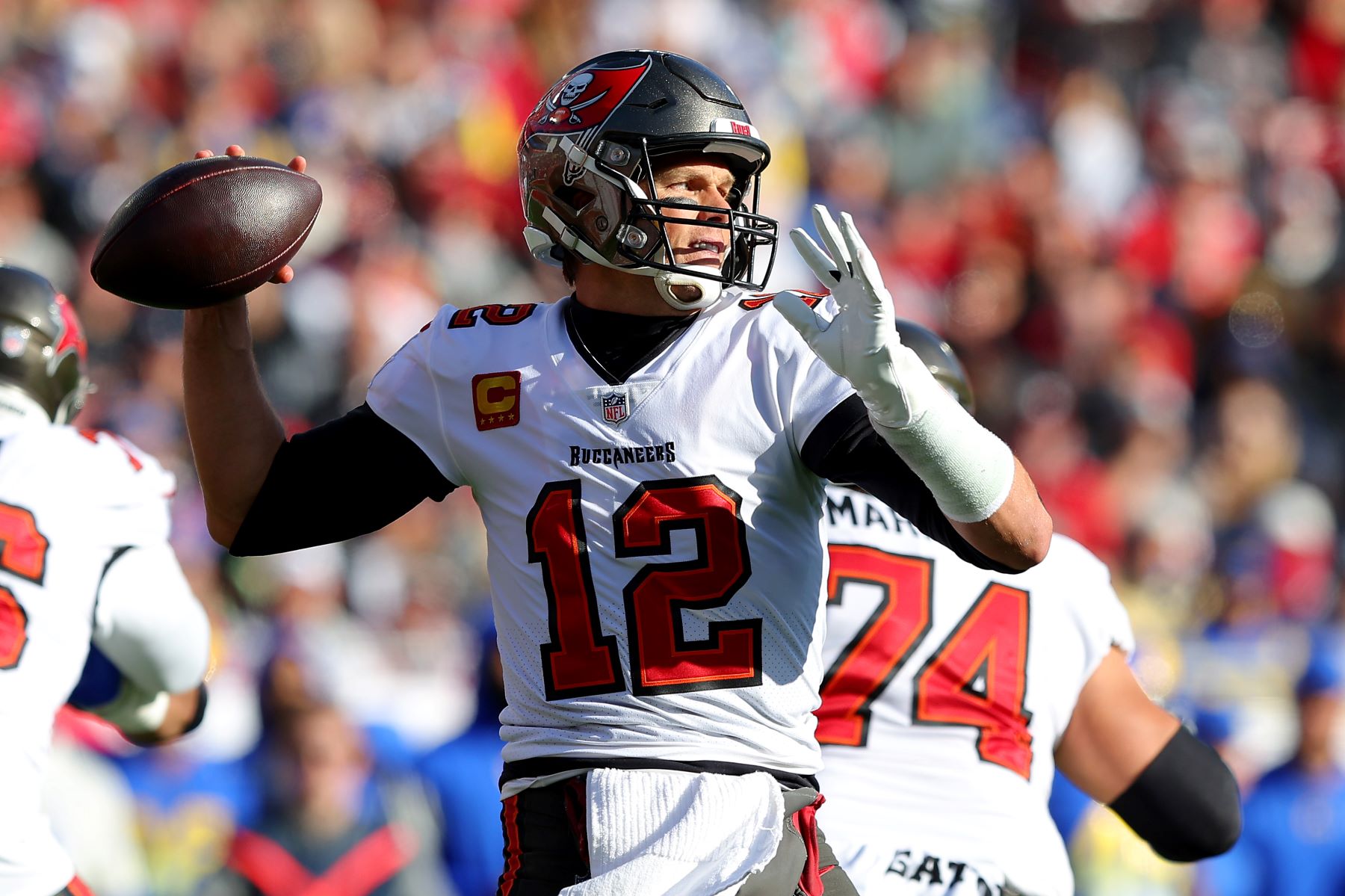Quarterback Tom Brady as #12 on the Tampa Bay Buccaneers NFL team playing against the Los Angeles Rams