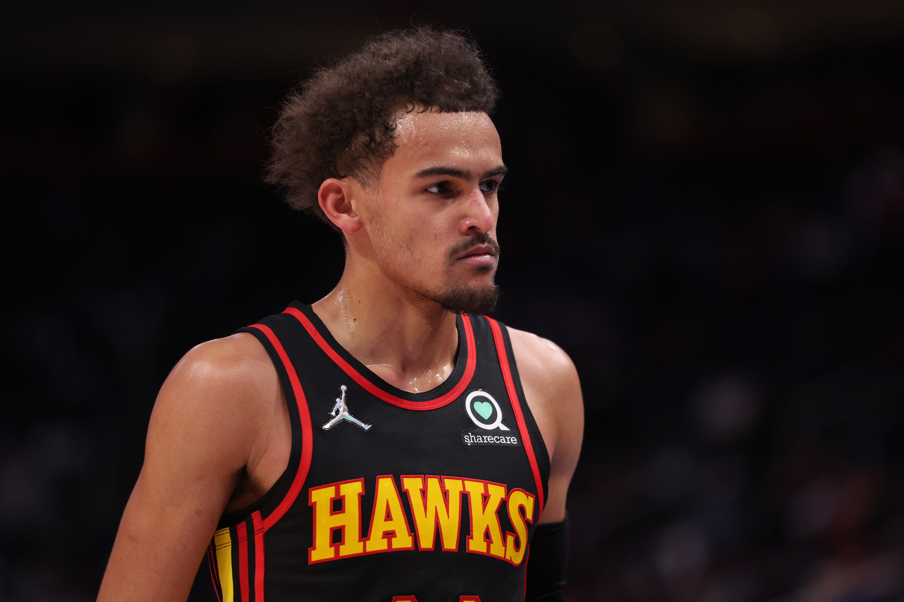 Atlanta Hawks guard Trae Young looks on during an NBA game against the Detroit Pistons