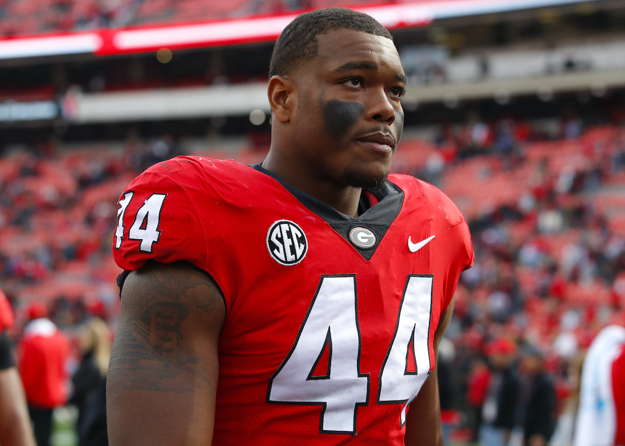 Travon Walker of the Georgia Bulldogs leaves the field at the conclusion of the game against the Missouri Tigers. According to Maurice Jones-Drew, Walker could be the No. 1 overall pick in the 2022 NFL Draft.
