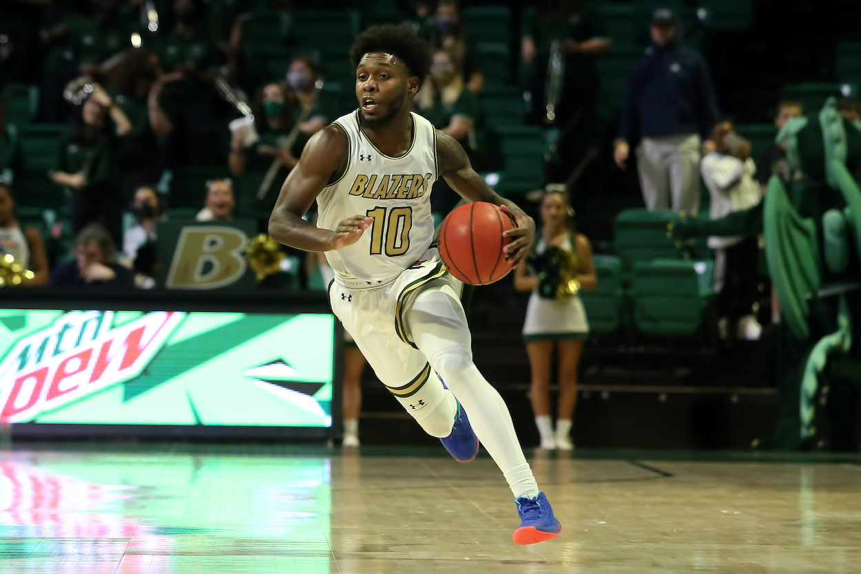 Jordan Walker dribbles for UAB.