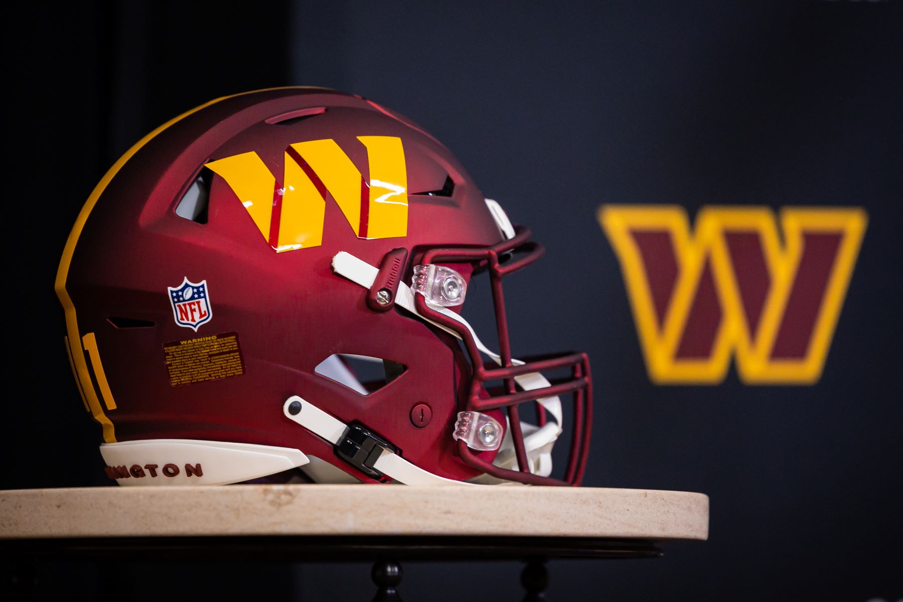 Washington Commanders helmet displayed during press conference at the Inova Sports Performance Center