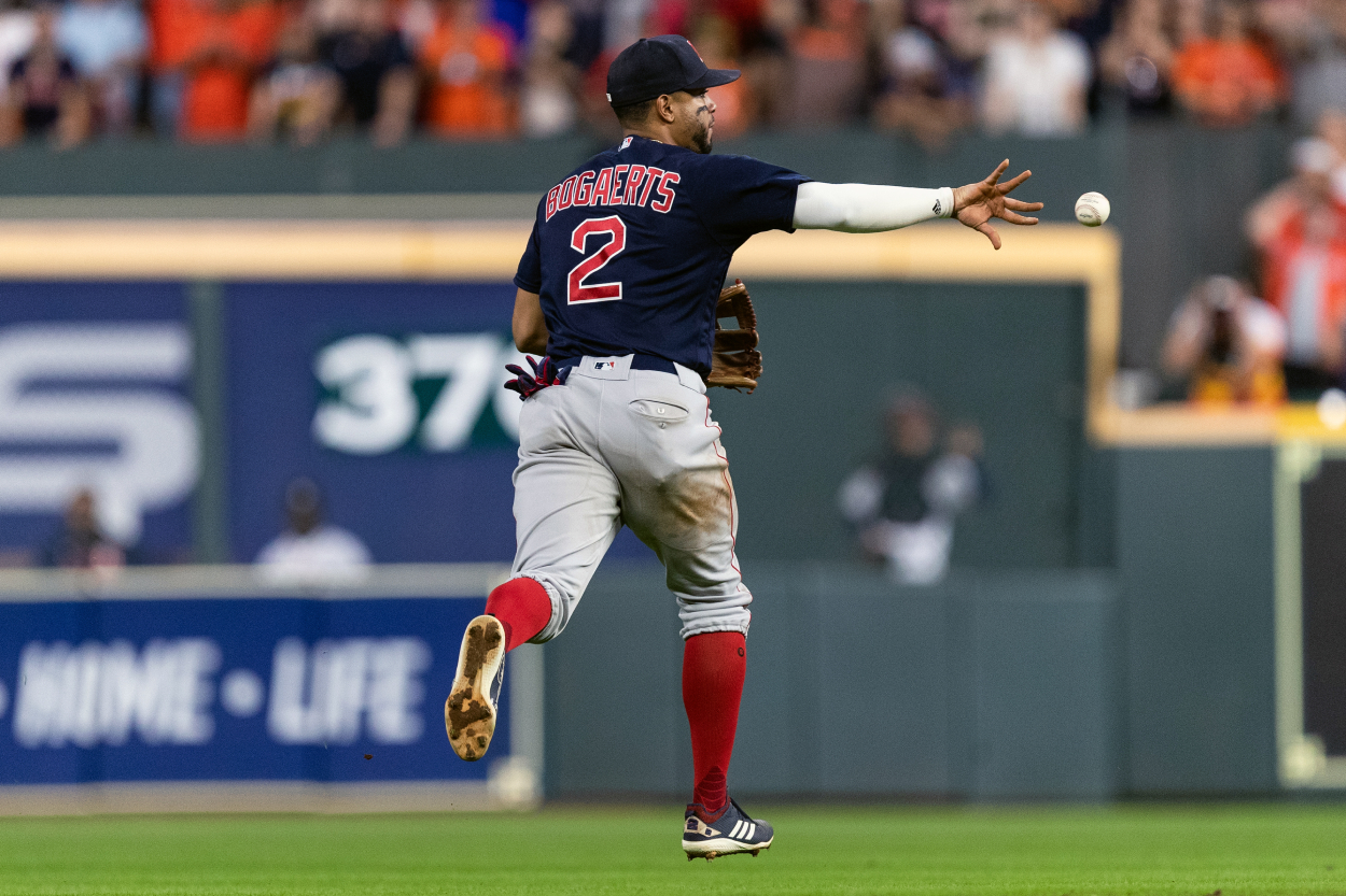 Xander Bogaerts of the Boston Red Sox makes a play during Game 6 of the ALCS between the Boston Red Sox and the Houston Astros.
