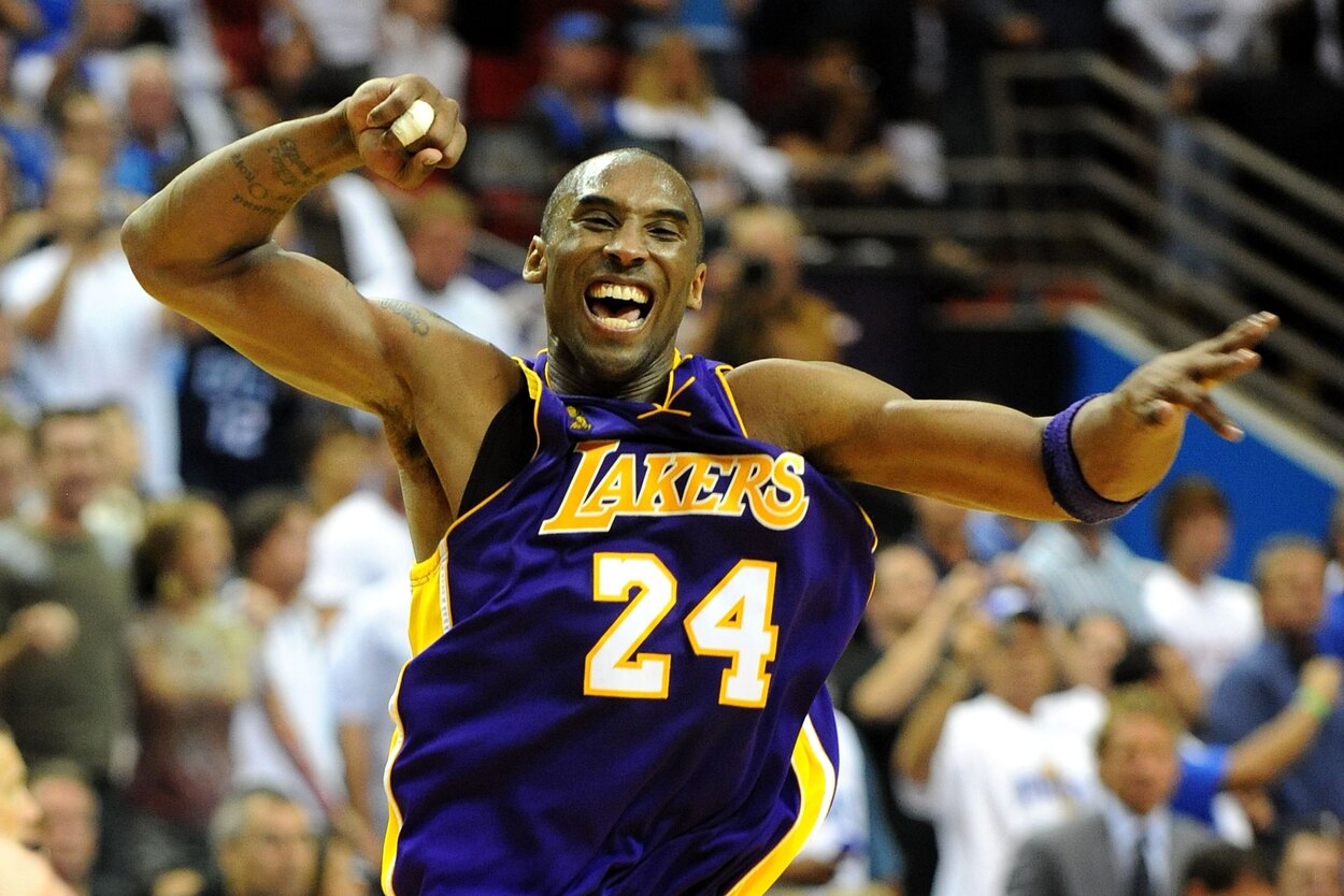 Los Angeles Lakers guard Kobe Bryant jumps up and celebrates after winning the NBA Finals.