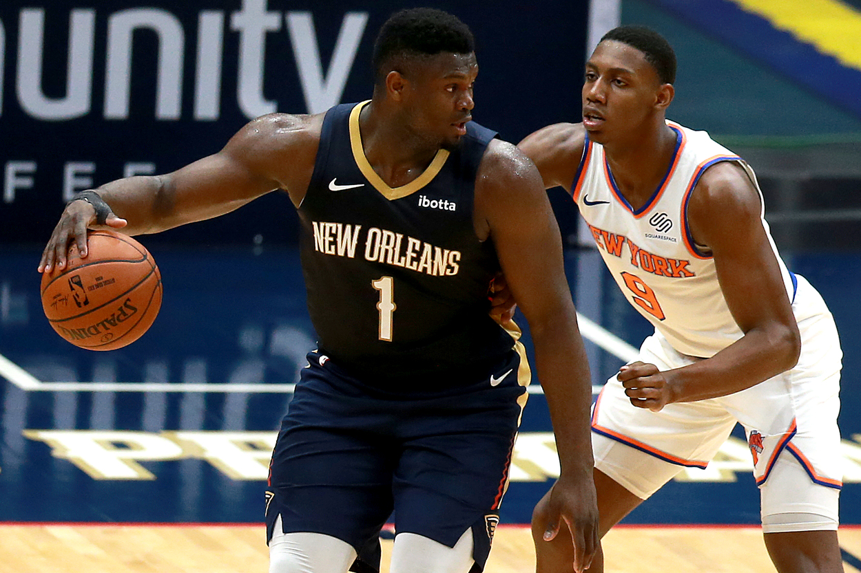 New Orleans Pelicans forward Zion Williamson backs down New York Knicks forward RJ Barrett.