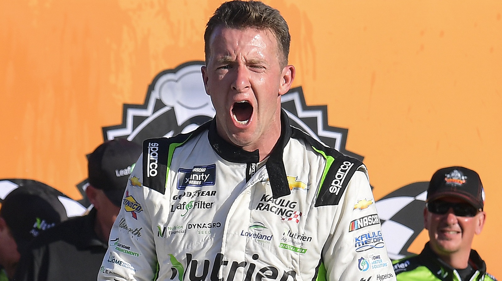 AJ Allmendinger celebrates in Victory Lane after winning the NASCAR Xfinity Series Pit Boss 250 at Circuit of The Americas on March 26, 2022.