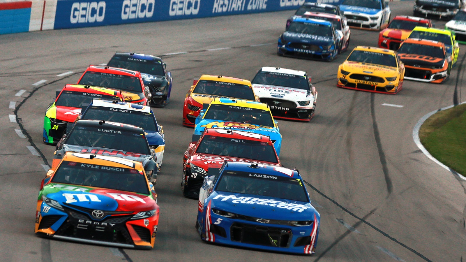 Kyle Busch and Kyle Larson lead the field to start the NASCAR All-Star Race at Texas Motor Speedway on June 13, 2021.