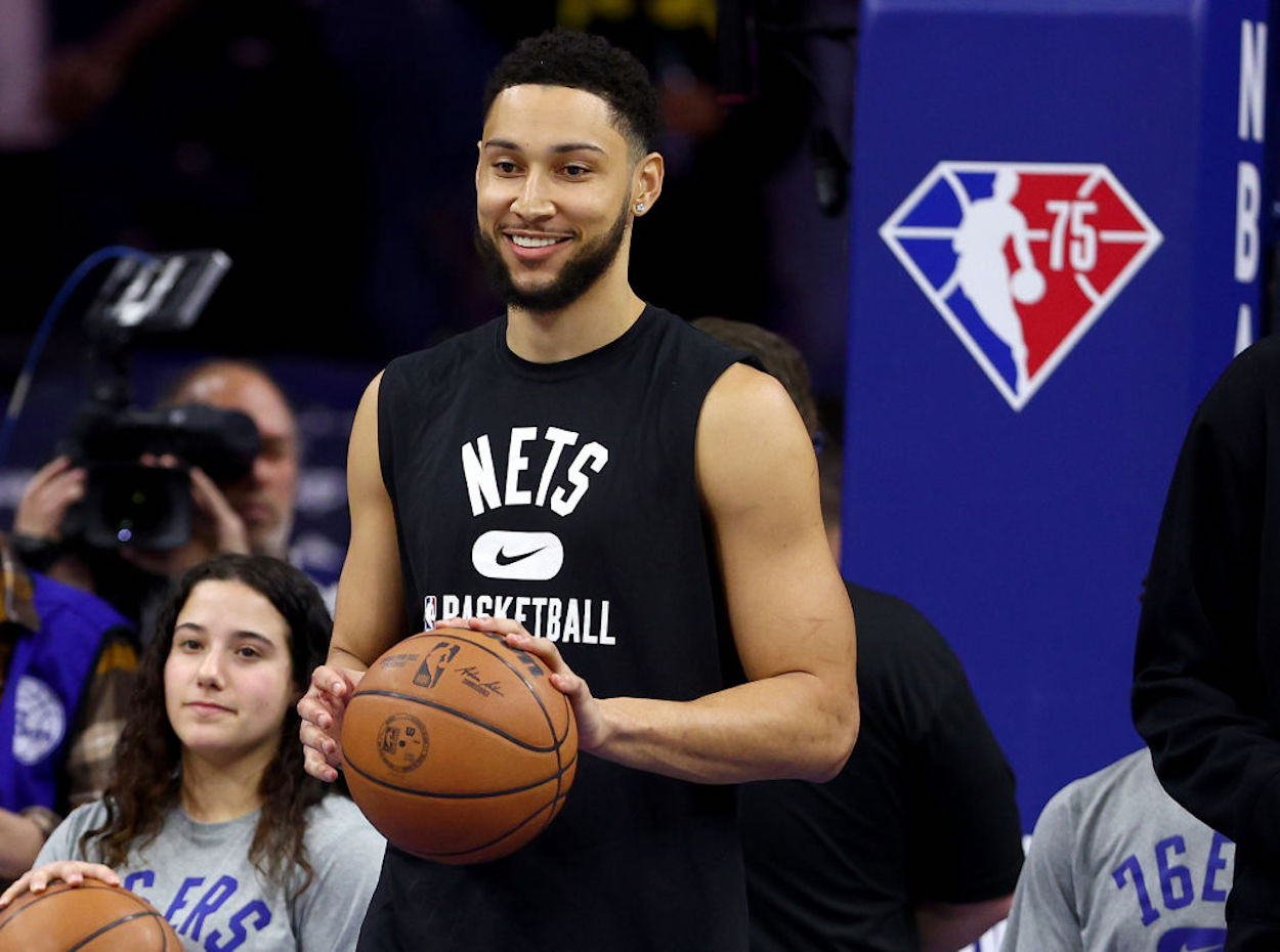 Brooklyn Nets guard Ben Simmons warms up before a game.