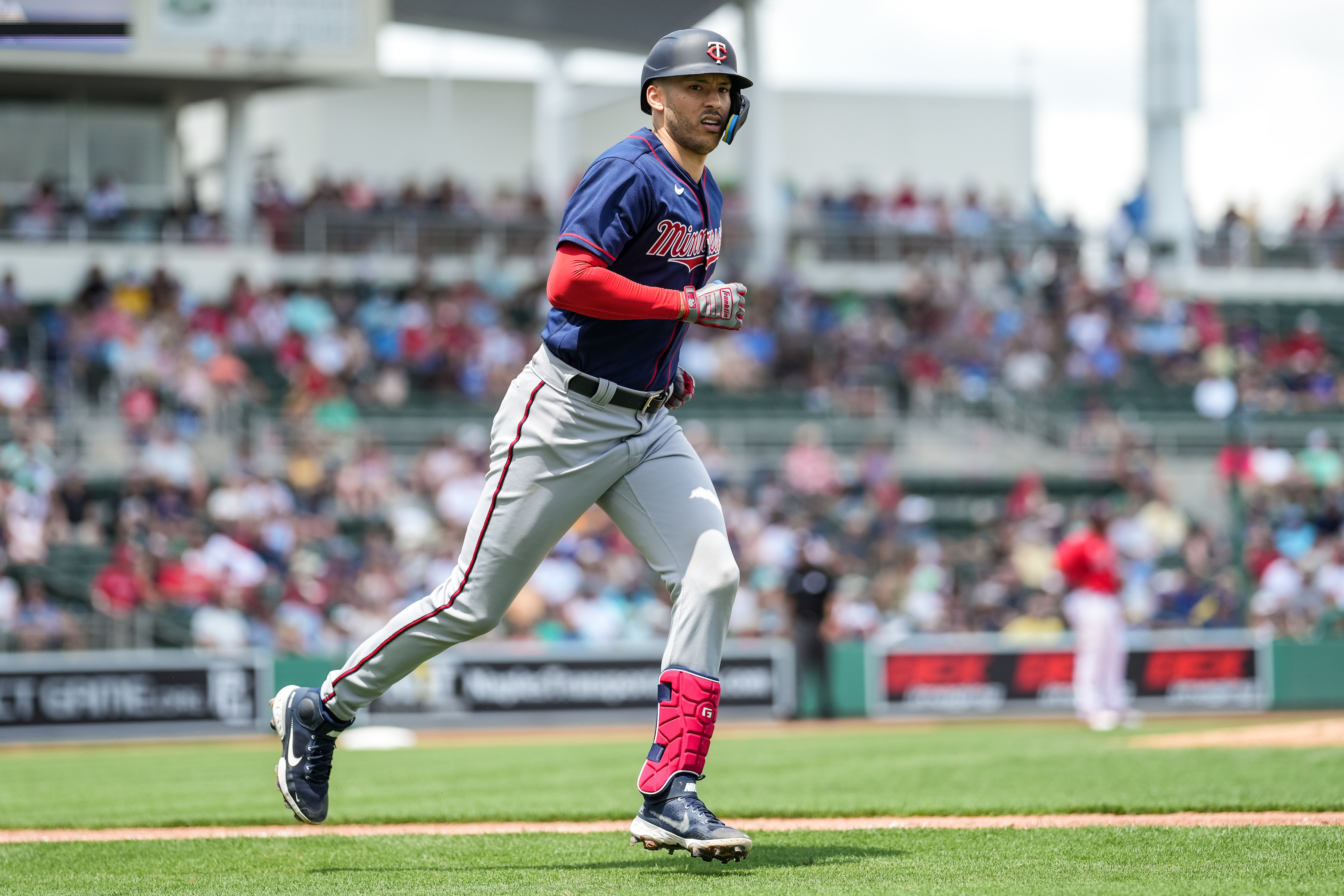 Minnesota Twins shortstop and Chicago Cubs free-agent target Carlos Correa runs the bases after hitting a home run during MLB Spring Training in April 2022