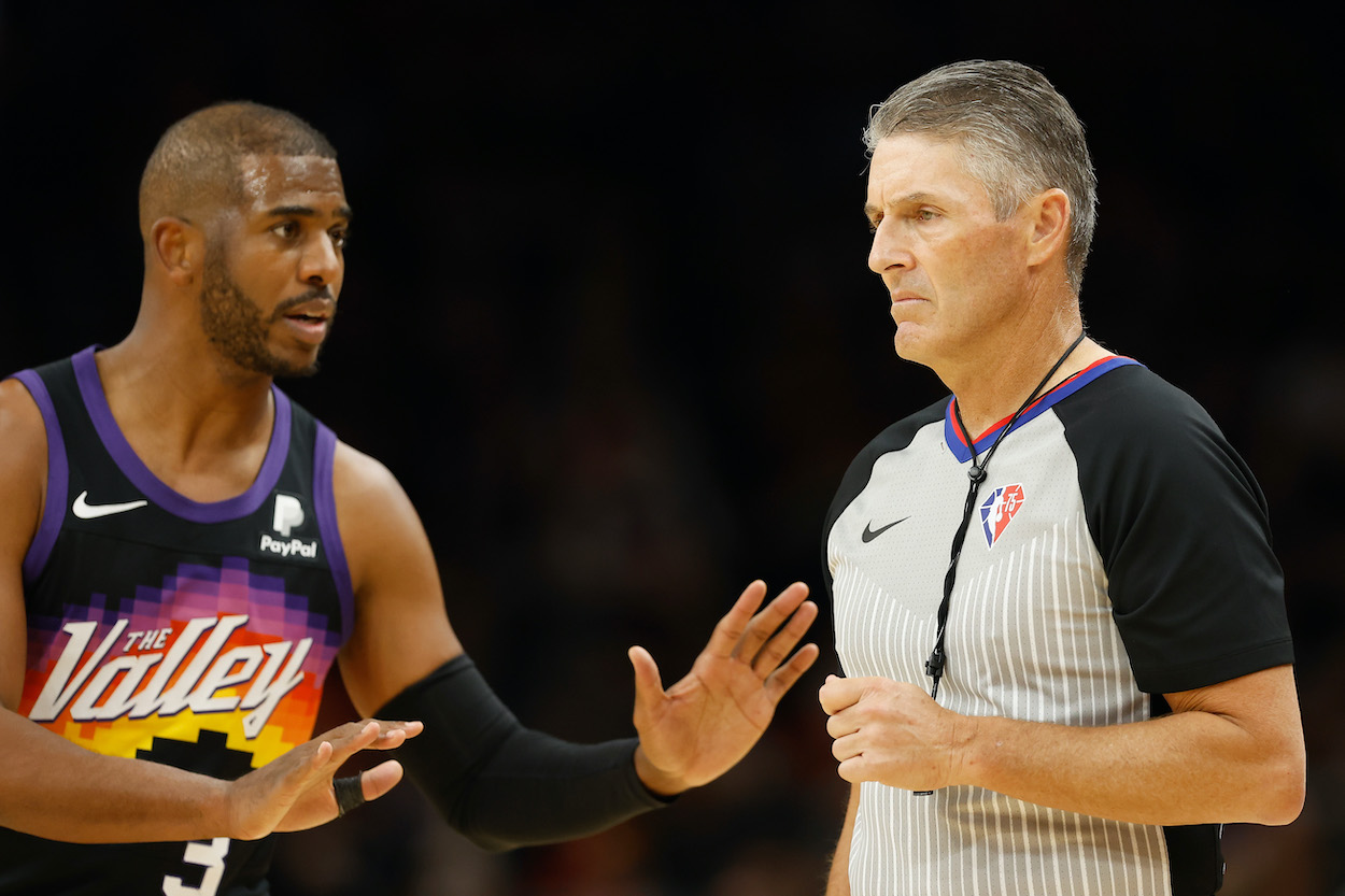 Chris Paul talks with referee Scott Foster.