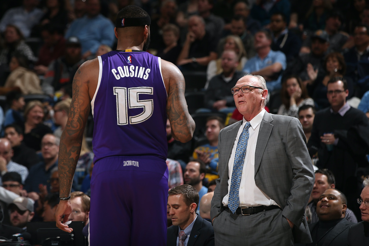 Head coach George Karl of the Sacramento Kings talks to DeMarcus Cousins in 2016.