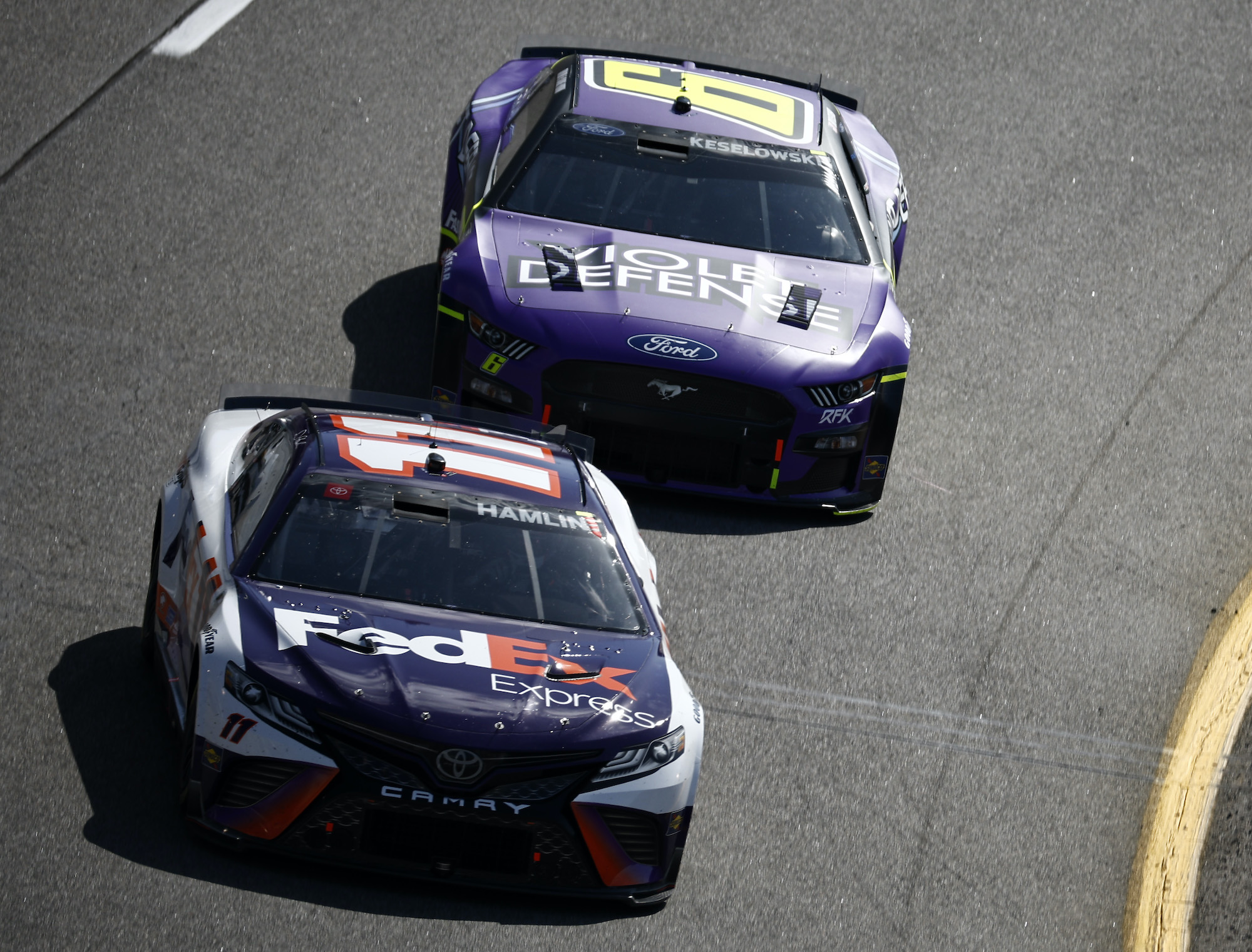 Denny Hamlin and Brad Keselowski race