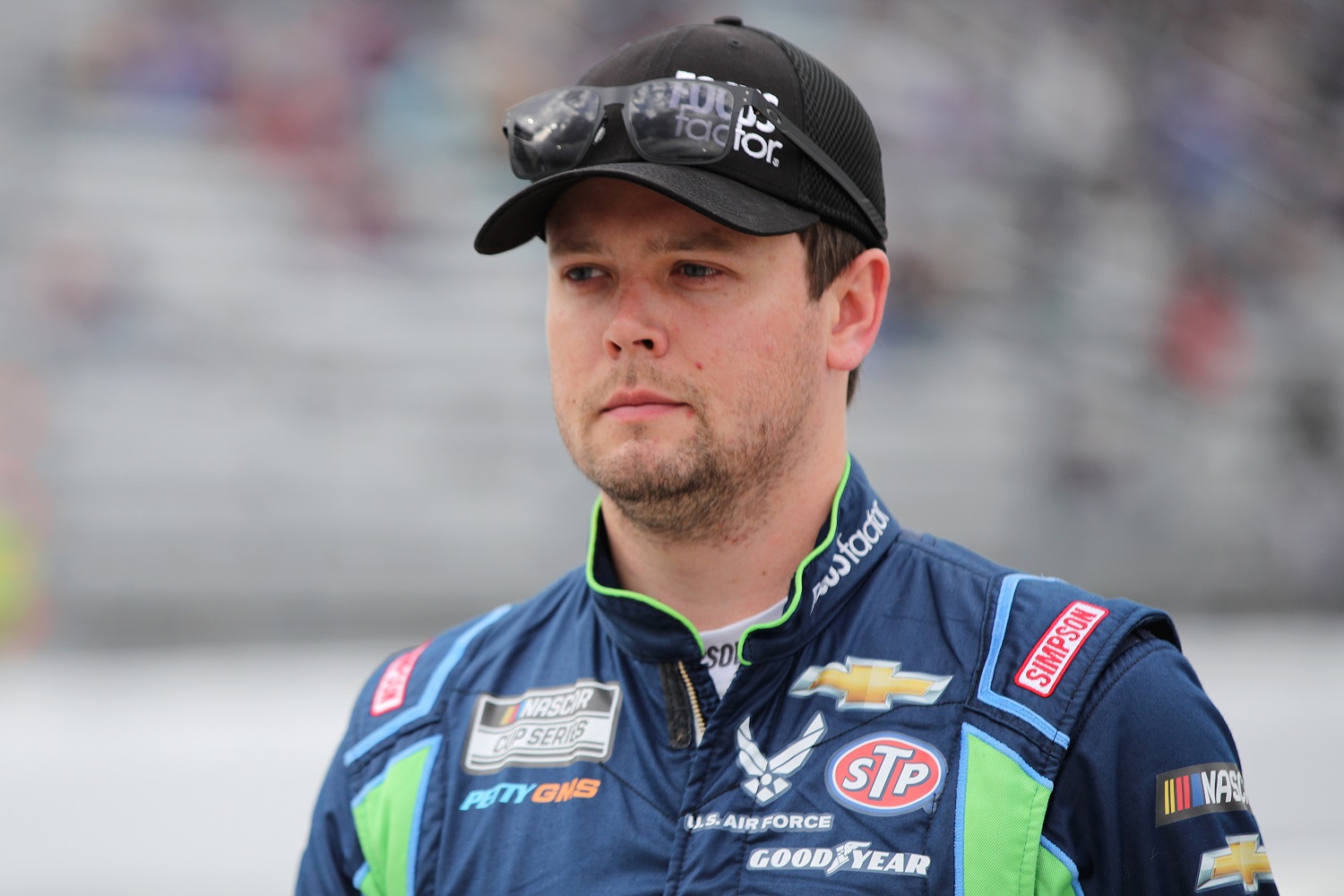 Erik Jones walks the grid during practice for the NASCAR Cup Series Blue-Emu Maximum Pain Relief 400 at Martinsville Speedway on April 8, 2022. | Meg Oliphant/Getty Images