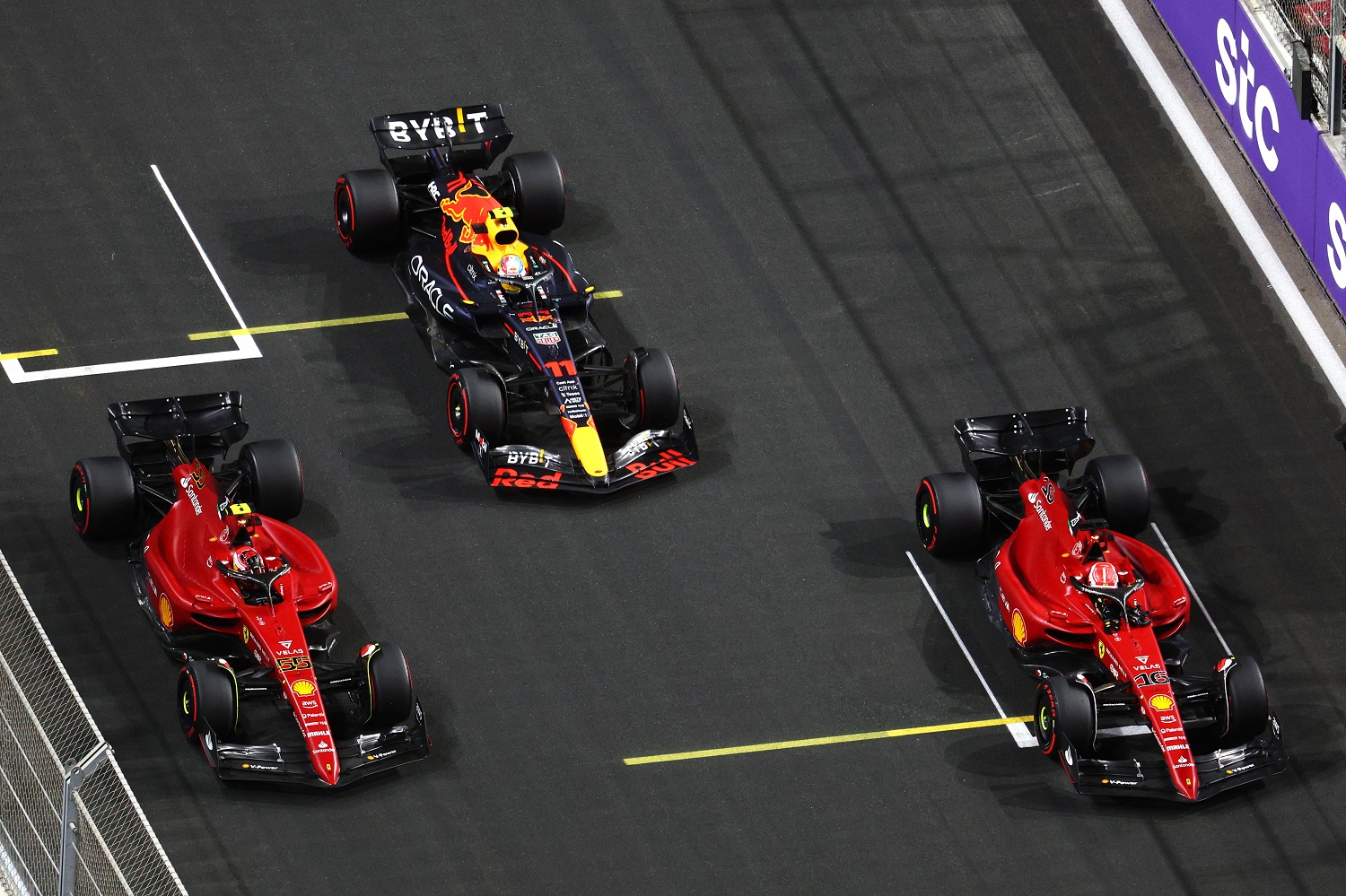 Pole position qualifier Sergio Perez, Charles Leclerc, and Carlos Sainz in parc ferme during qualifying ahead of the Formula 1 Grand Prix of Saudi Arabia at the Jeddah Corniche Circuit on March 26, 2022.