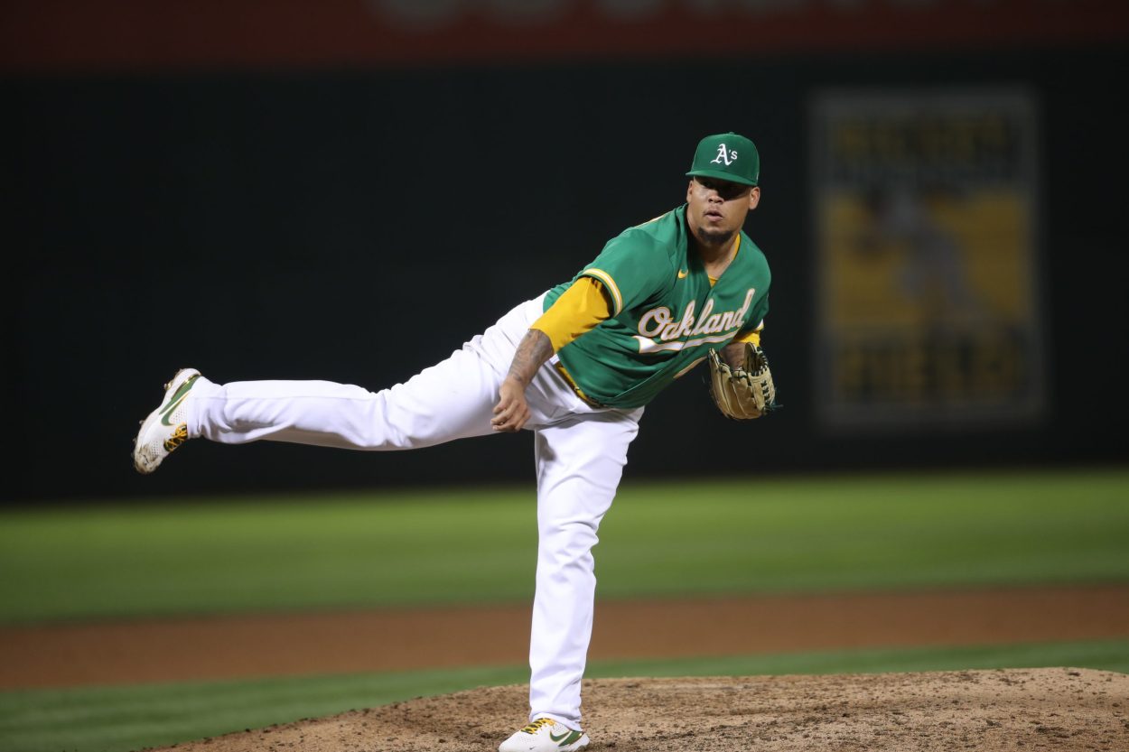 Oakland Athletics right-hander Frankie Montas delivers a pitch during an MLB game against the Chicago White Sox in September 2021
