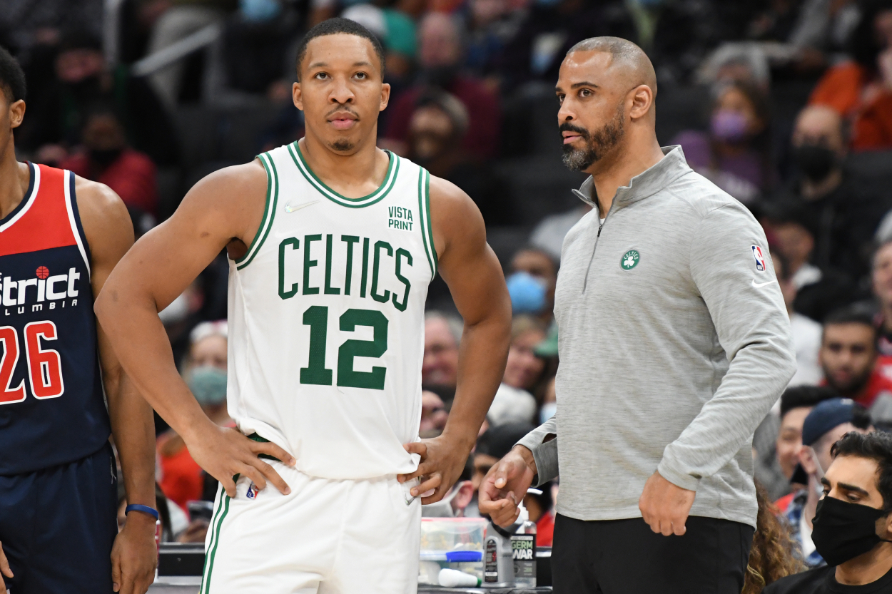 Head coach Ime Udoka talks to Grant Williams of the Boston Celtics.