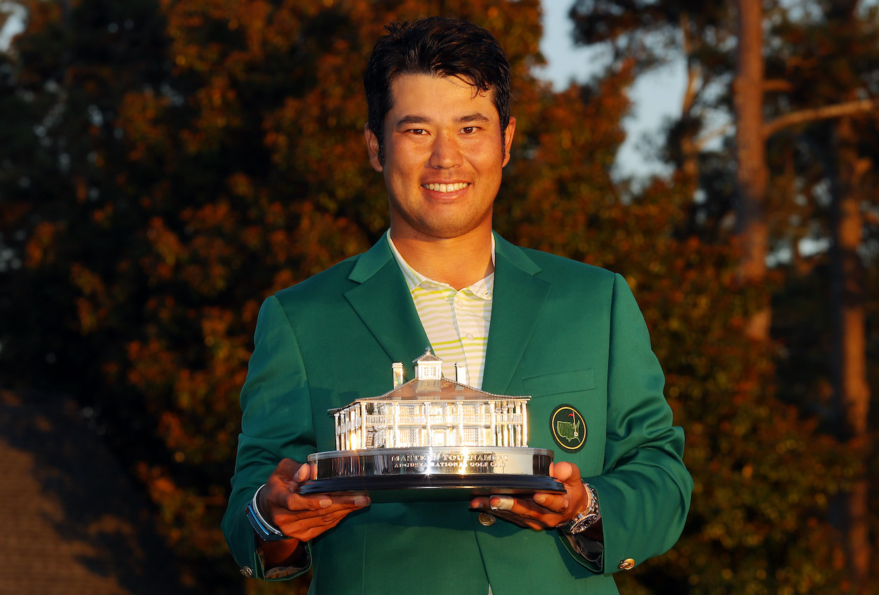 Hideki Matsuyama poses after winning the Masters.