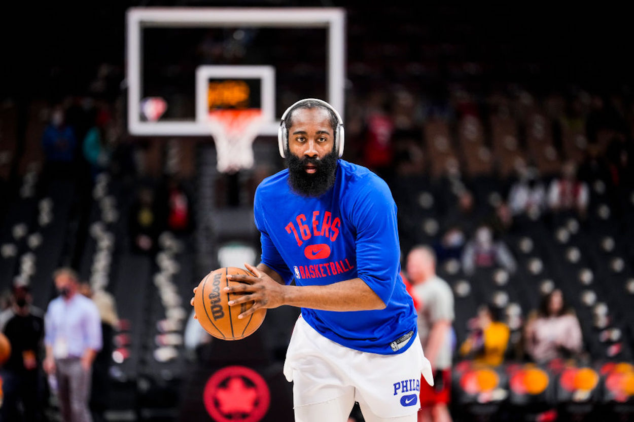 Philadelphia 76ers guard James Harden warms up before a game.