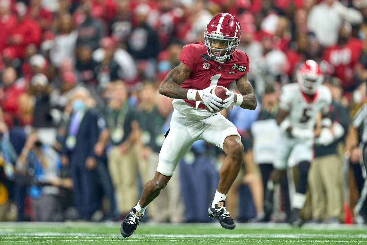 Jameson Williams runs with the ball against Georgia.