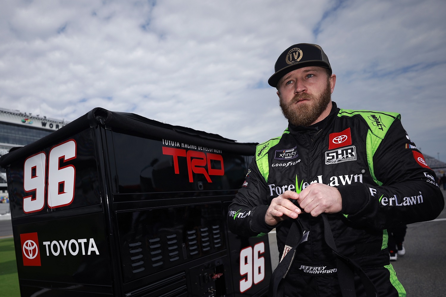 Jeffrey Earnhardt walks the grid during qualifying for the NASCAR Xfinity Series race at Daytona International Speedway on Feb. 19, 2022.