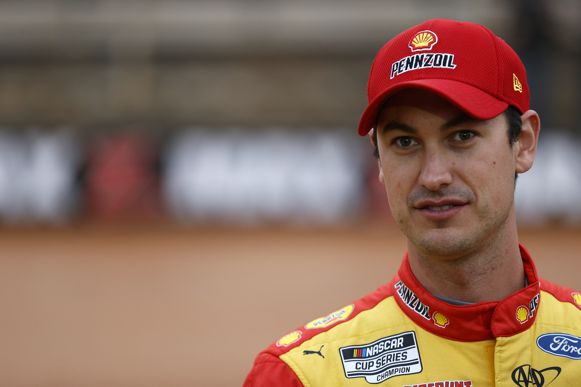 Joey Logano waits on grid