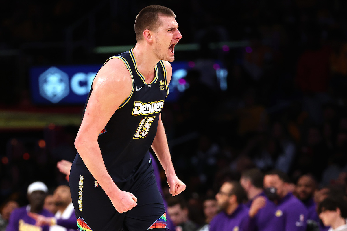 Nikola Jokic screams in celebration for the Denver Nuggets