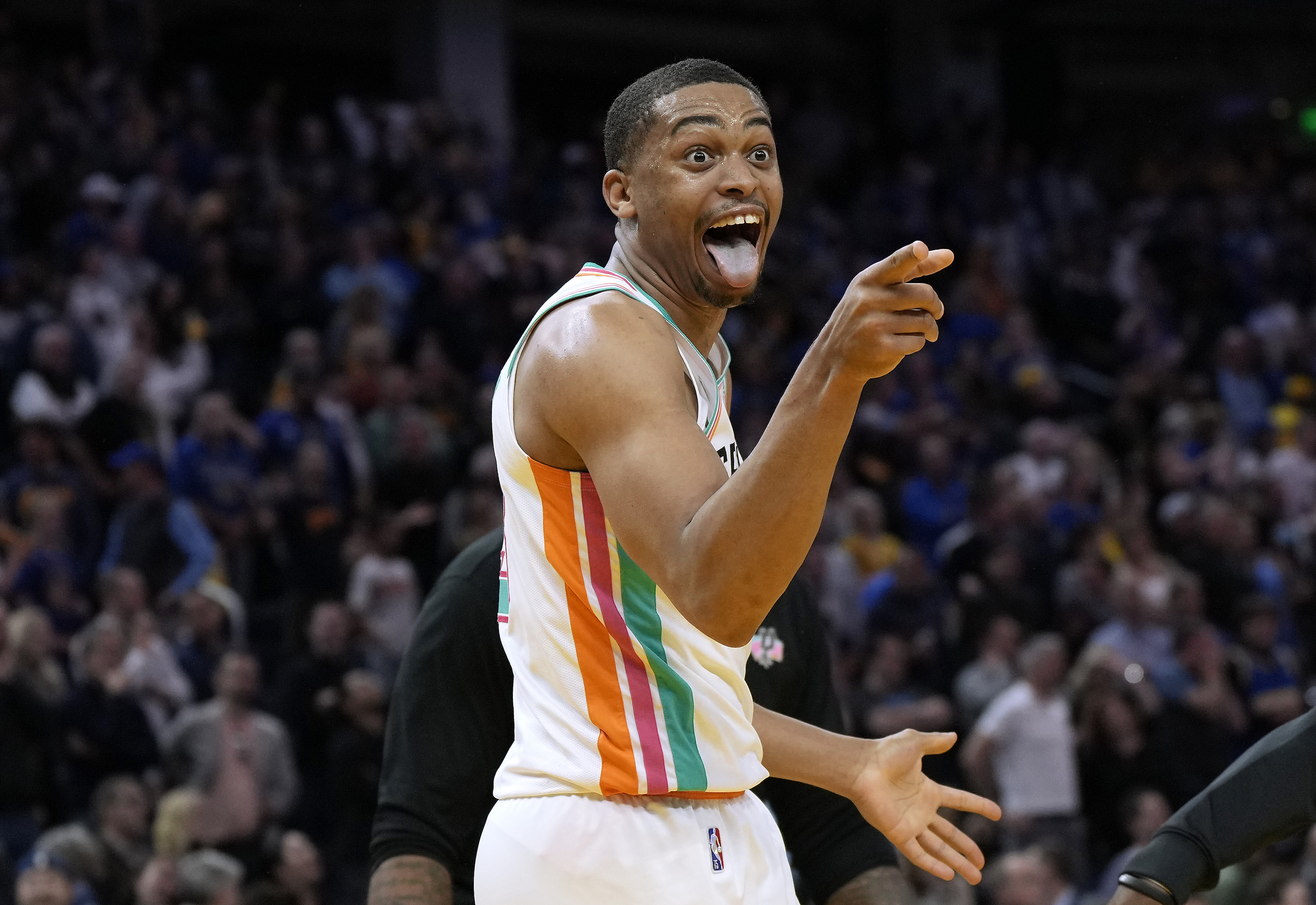 San Antonio Spurs wing Keldon Johnson celebrates during an NBA game against the Golden State Warriors in March 2022
