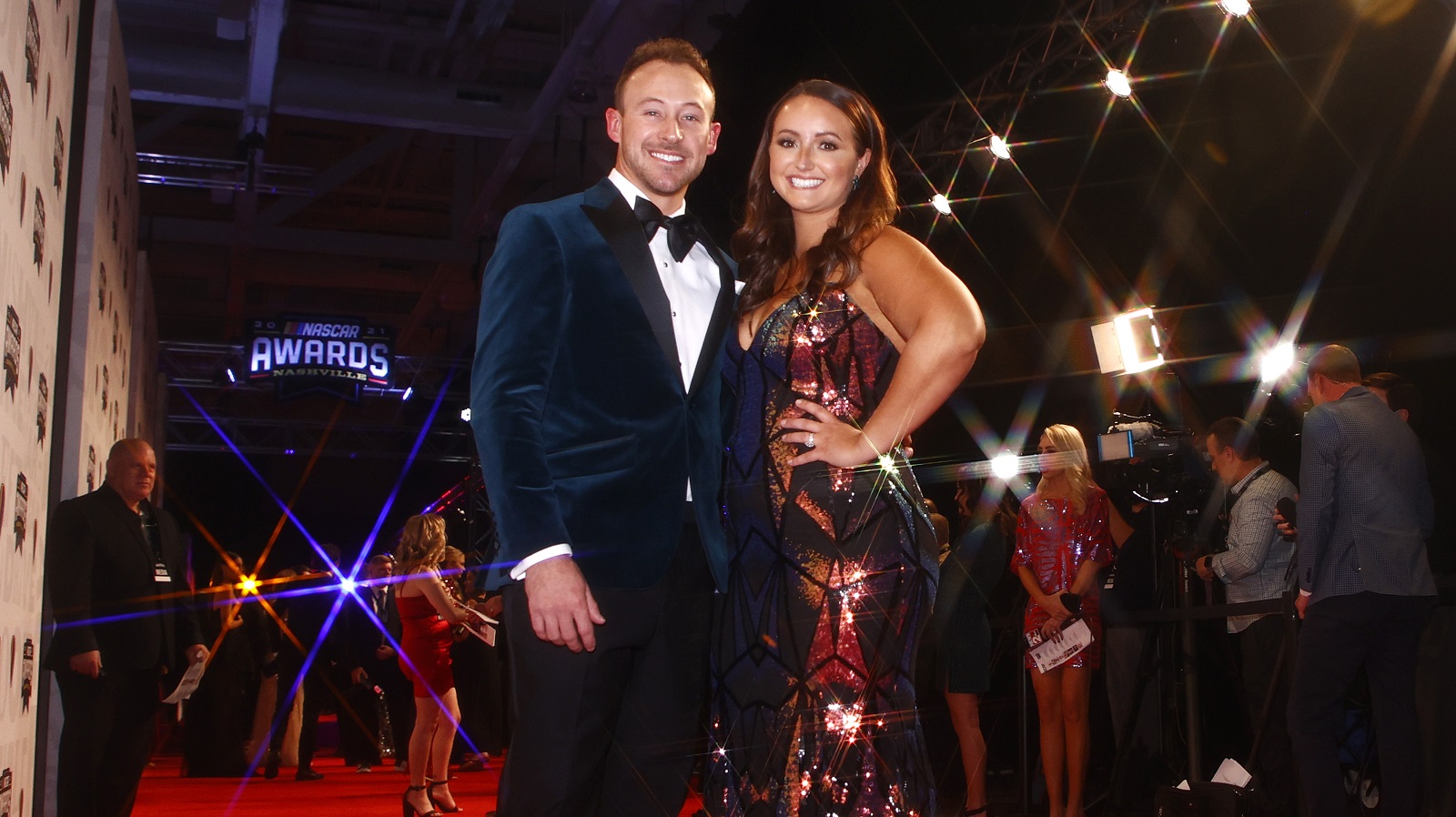 NASCAR Xfinity Series champion Daniel Hemric and his wife Kenzie Hemric pose on the red carpet prior to the NASCAR Champions Banquet on Dec. 2, 2021, in Nashville, Tennessee. | Jared C. Tilton/Getty Images