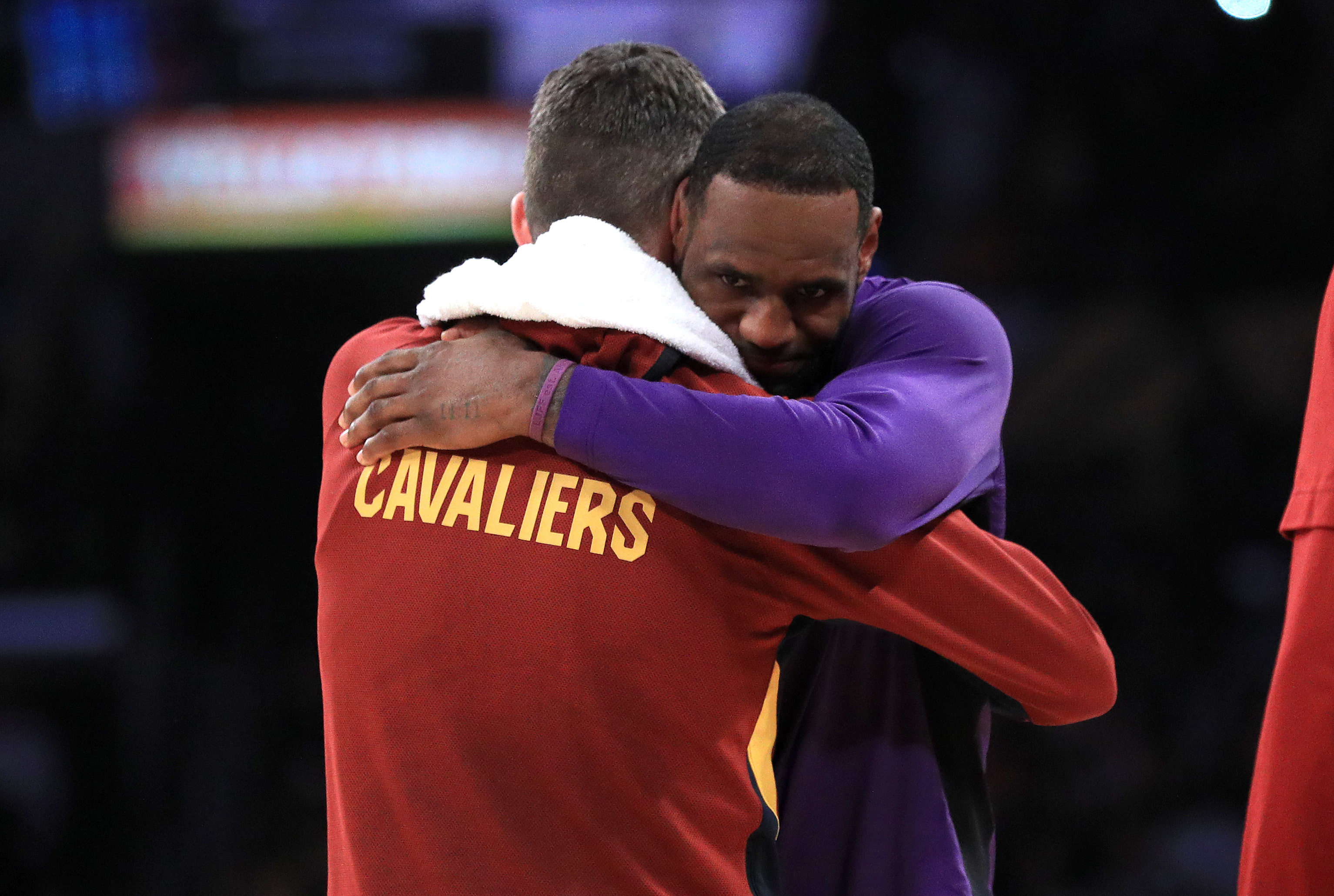 Kevin Love and LeBron James embrace after an NBA game between the Cleveland Cavaliers and Los Angeles Lakers in January 2022