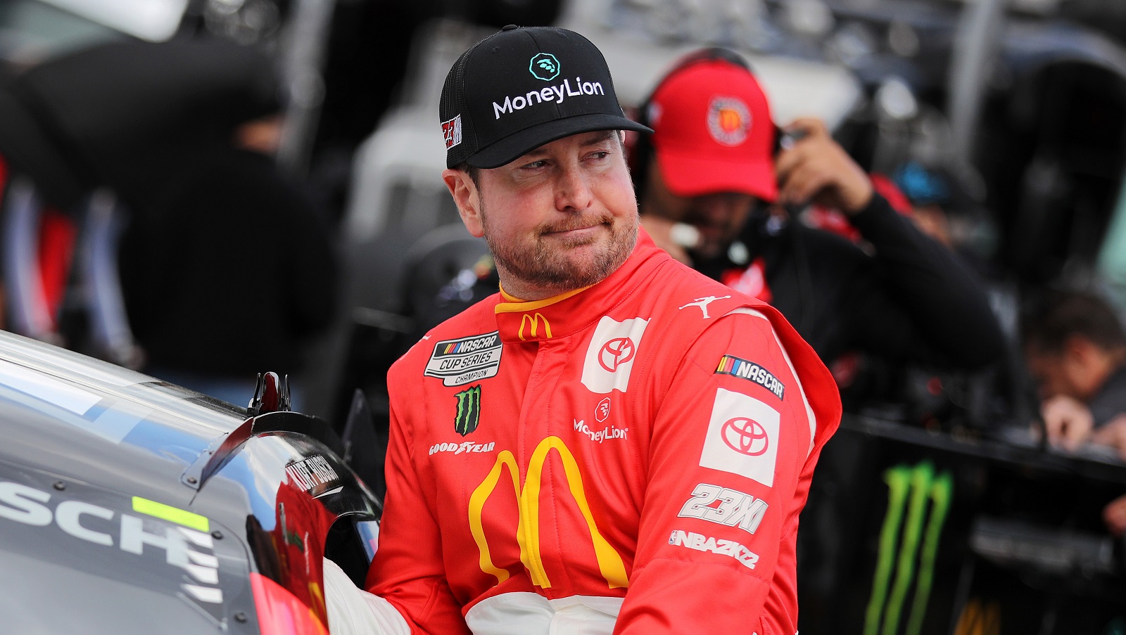 Kurt Busch, driver of the No. 45 Toyota, enters his car during practice for the NASCAR Cup Series Blue-Emu Maximum Pain Relief 400 at Martinsville Speedway on April 8, 2022.