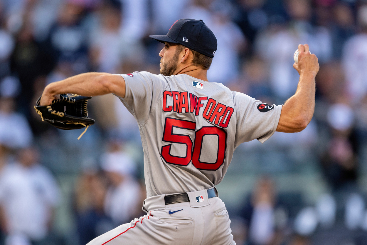 Kutter Crawford of the Boston Red Sox pitches during the 11th inning of the 2022 Major League Baseball Opening Day game against the New York Yankees.