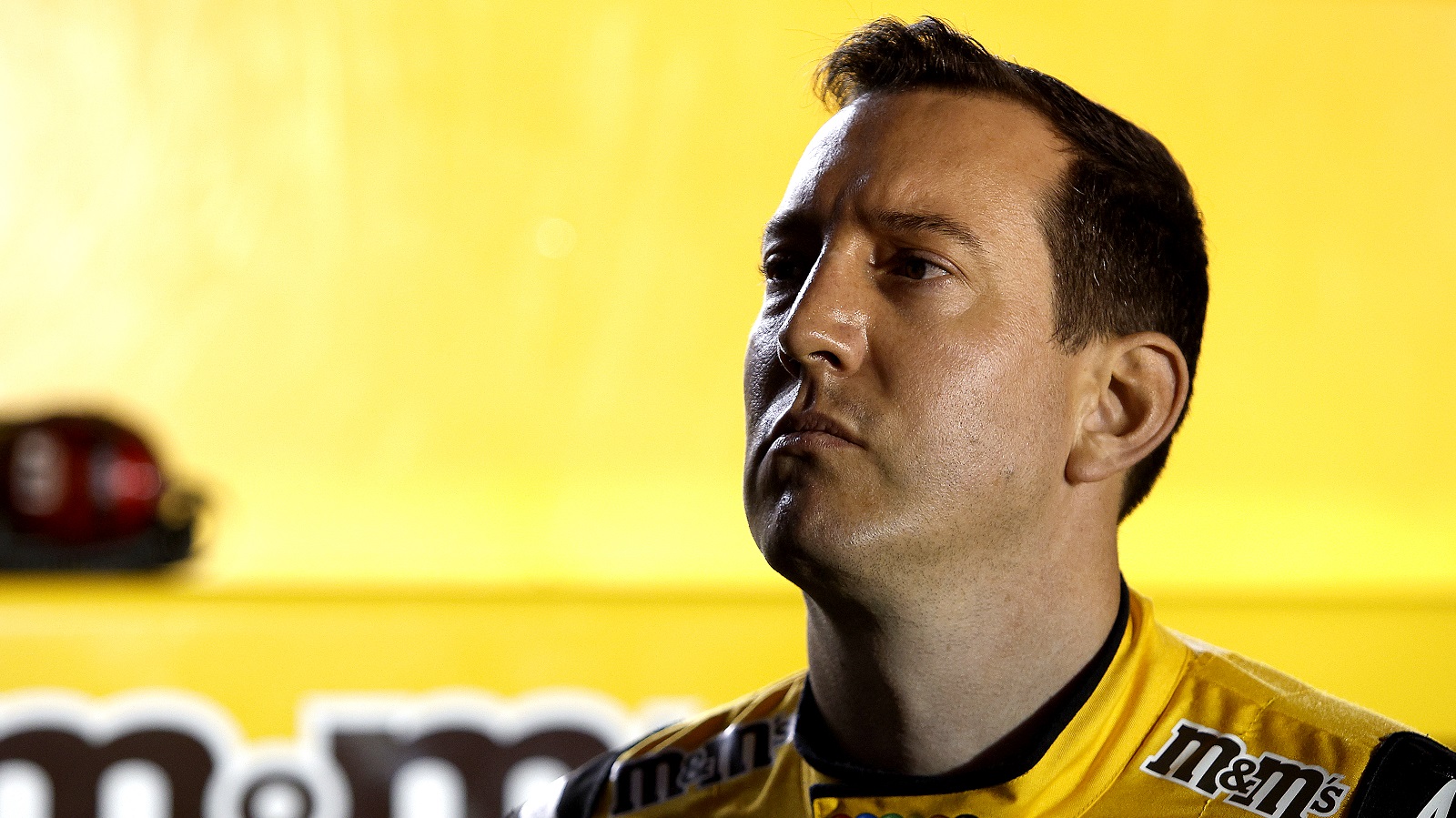 Kyle Busch, driver of the No. 18 Toyota, looks on during qualifying for the NASCAR Cup Series Daytona 500 on Feb. 16, 2022.