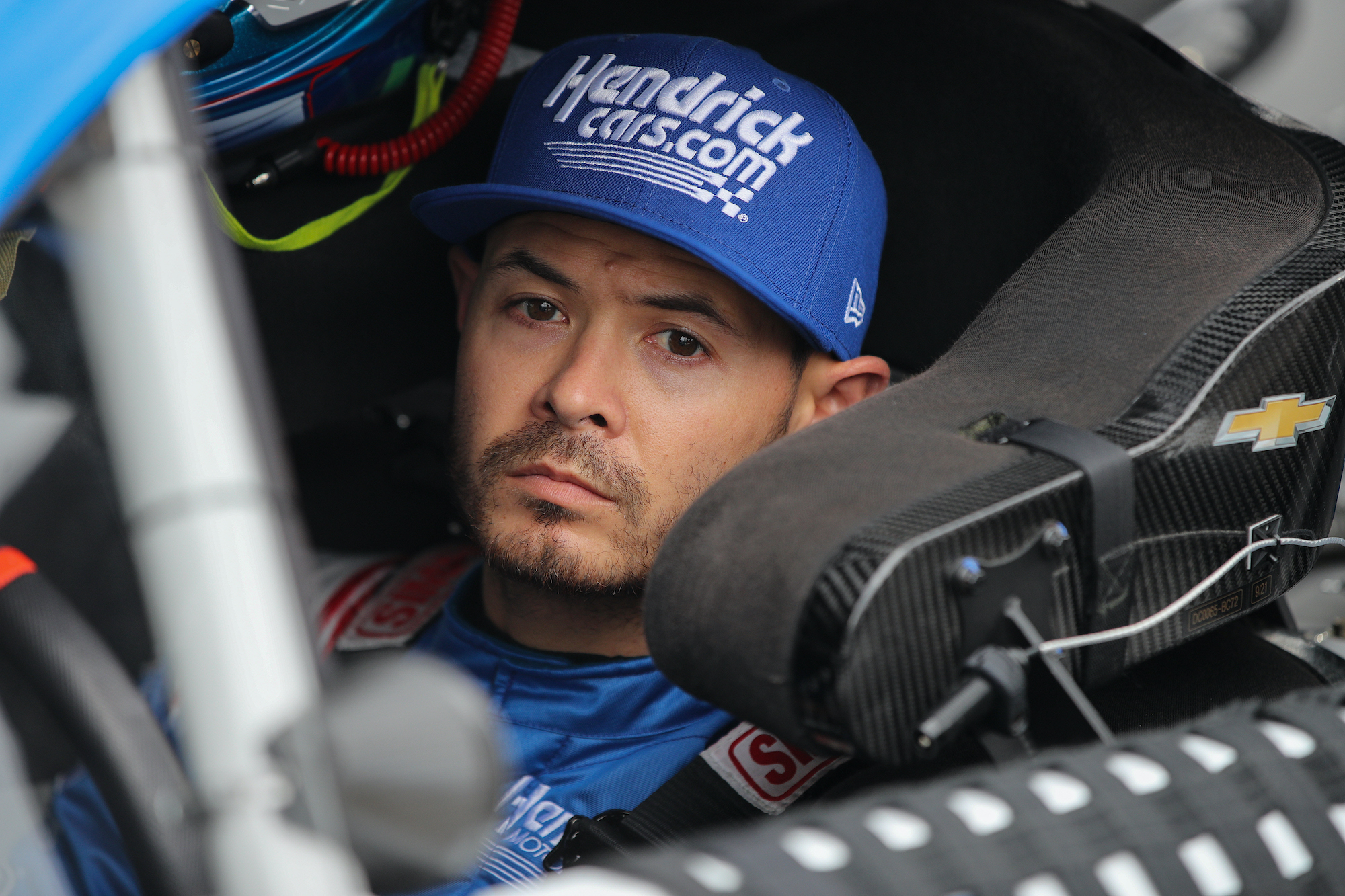 Kyle Larson sits in car
