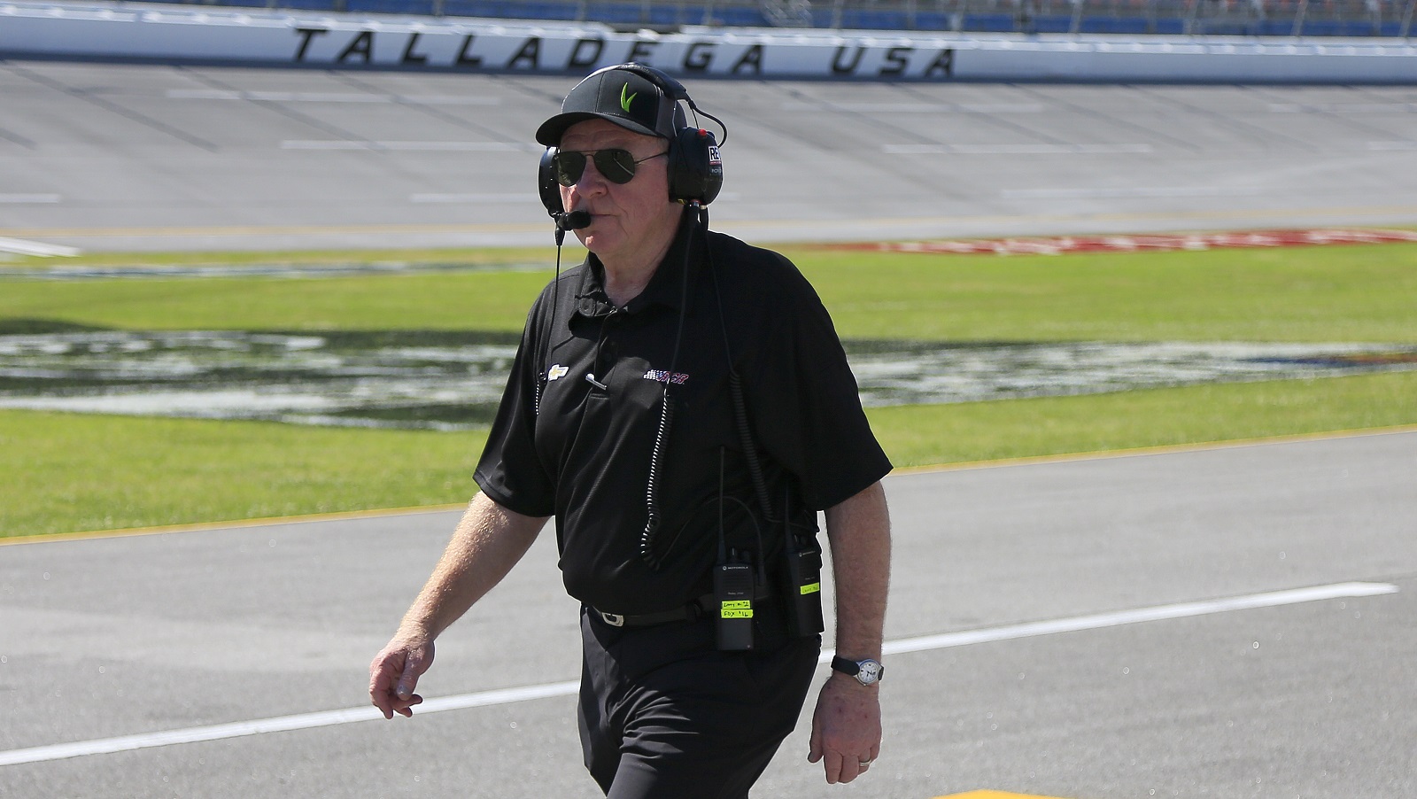 Crew chief of the No, 3 Chevy Larry McReynolds makes his way to his pit box before the Ag-Pro 300 NASCAR Xfinity Series race on April 23, 2022, at Talladega Superspeedway.