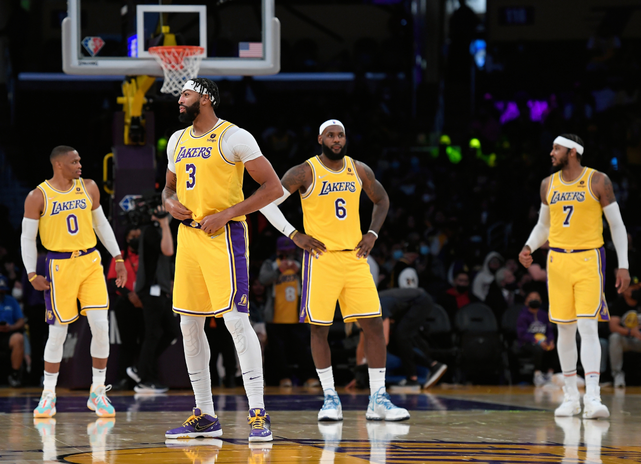 Los Angeles Lakers players against the Golden State Warriors in October 2021.