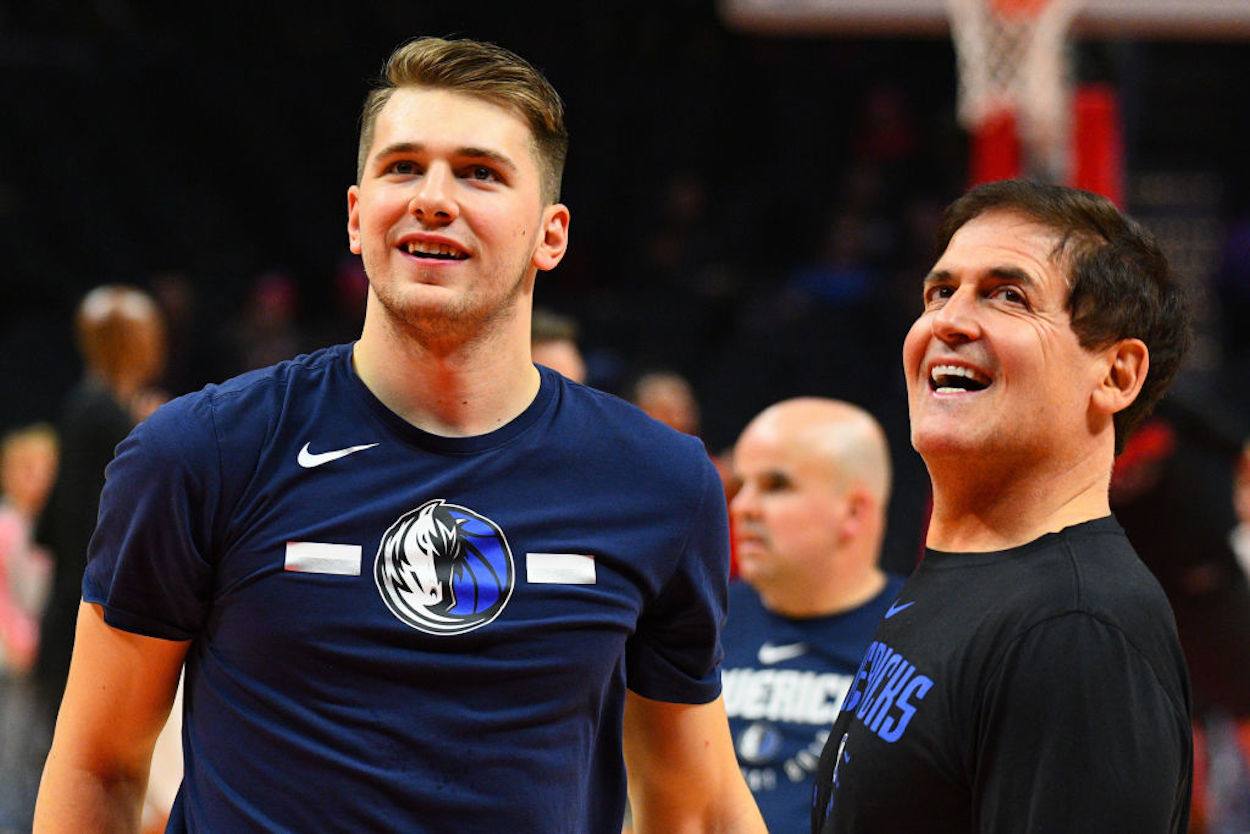 Luka Doncic (L) and Mark Cuban (R) before a Dallas Mavericks game.