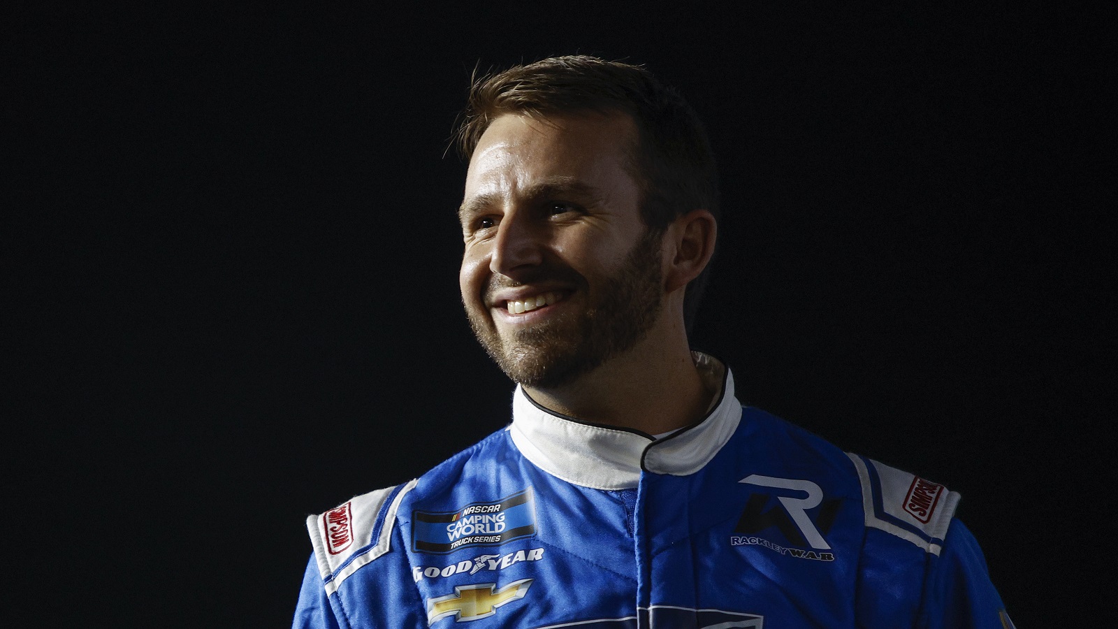 Matt DiBenedetto walks onstage during driver intros prior to the NASCAR Camping World Truck Series NextEra Energy 250 at Daytona International Speedway on Feb. 18, 2022.