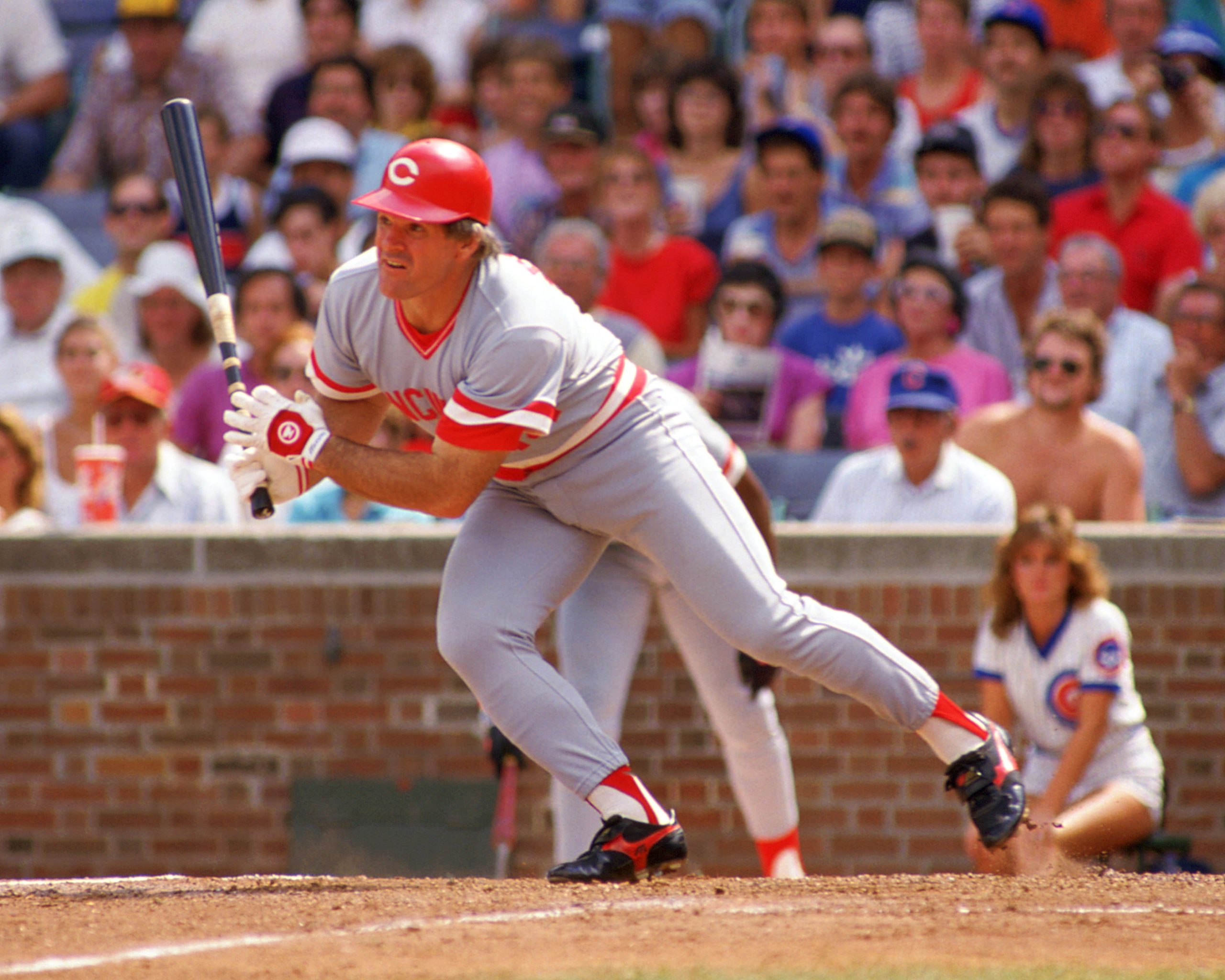Pete Rose of the Cincinnati Reds bats during an MLB game against the Chicago Cubs.