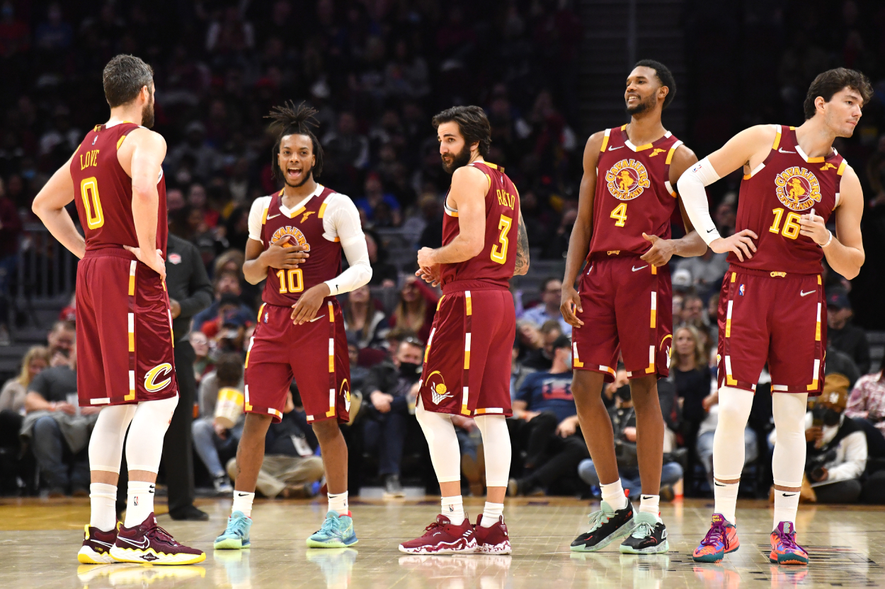 Cleveland Cavaliers players Kevin Love, Darius Garland, Ricky Rubio, Evan Mobley, and Cedi Osman in 2021.