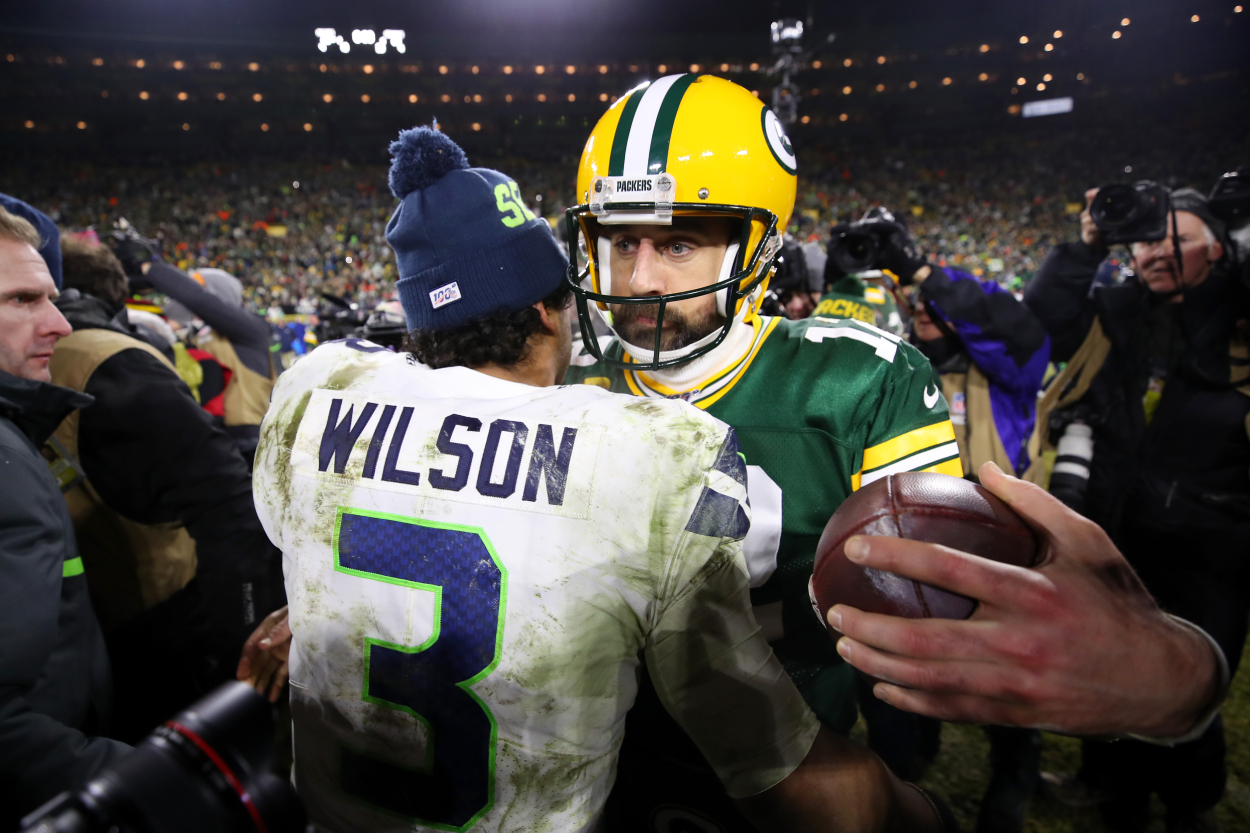 Russell Wilson of the Seattle Seahawks greets Aaron Rodgers of the Green Bay Packers.