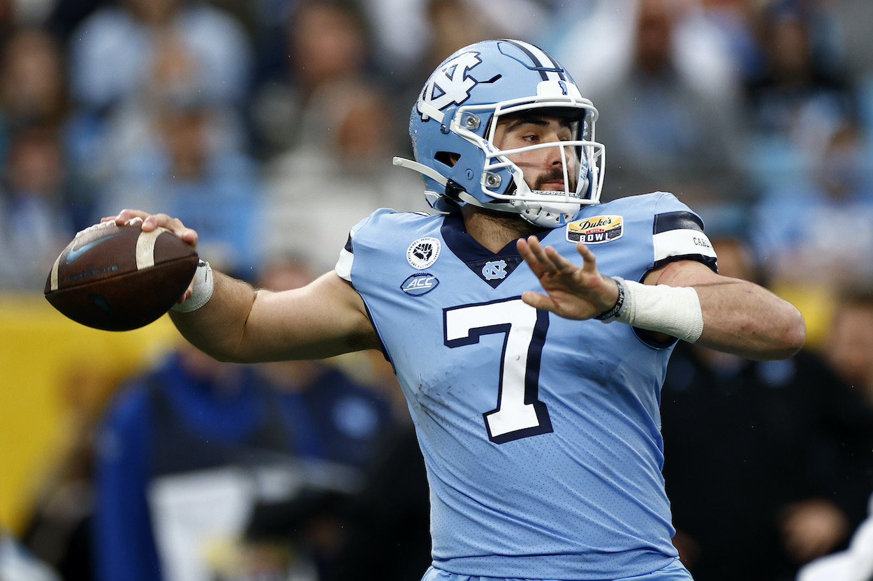 Sam Howell of the North Carolina Tar Heels looks to pass during the first half of the Duke's Mayo Bowl against the South Carolina Gamecocks. Howell could be a New York Giants NFL draft target.