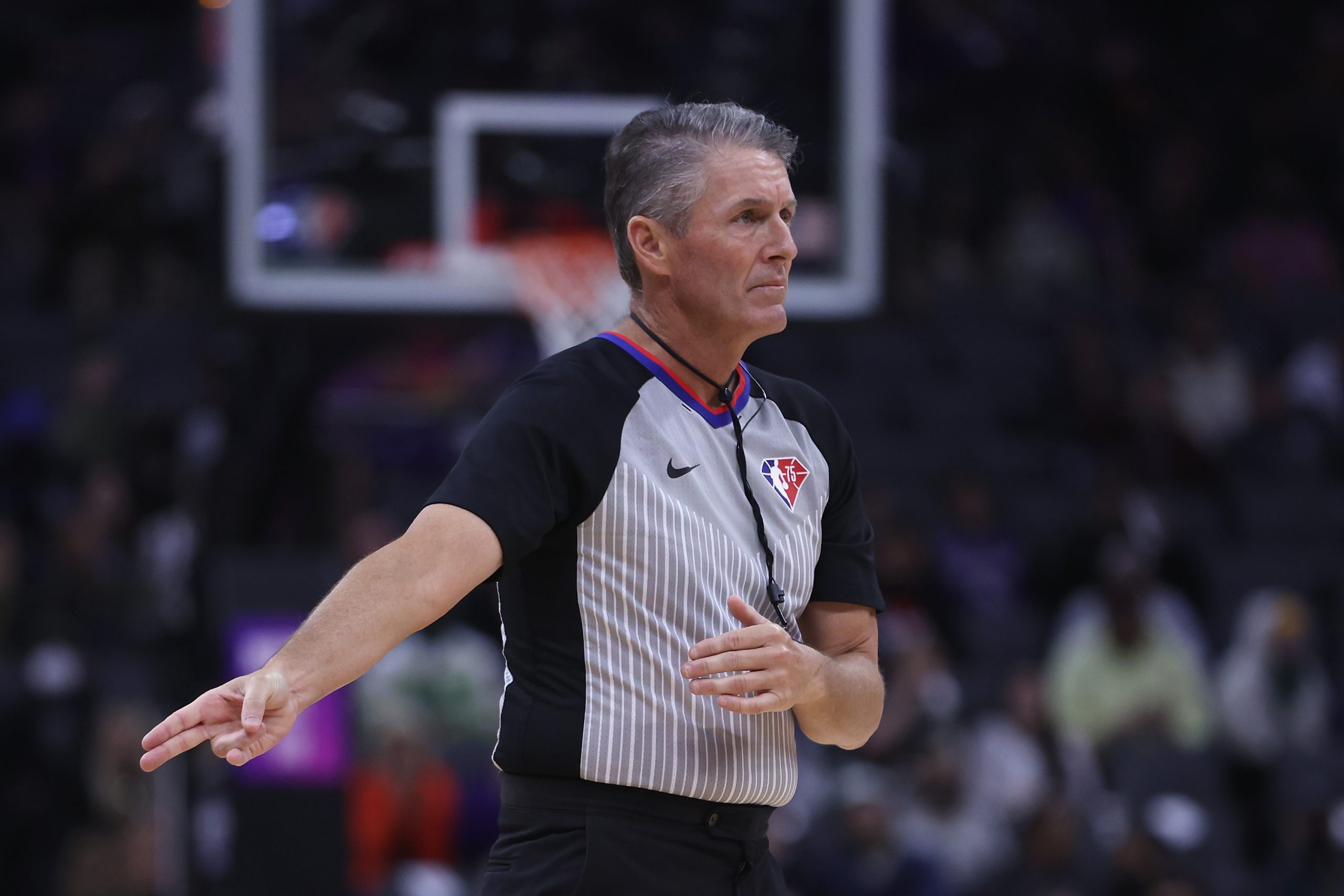 Referee Scott Foster officiates the game between the Sacramento Kings and the Denver Nuggets.