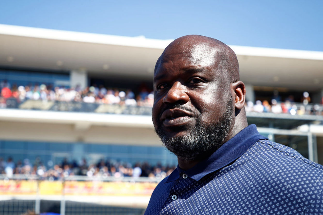Shaquille O'Neal walks the track at a Formula 1 event.