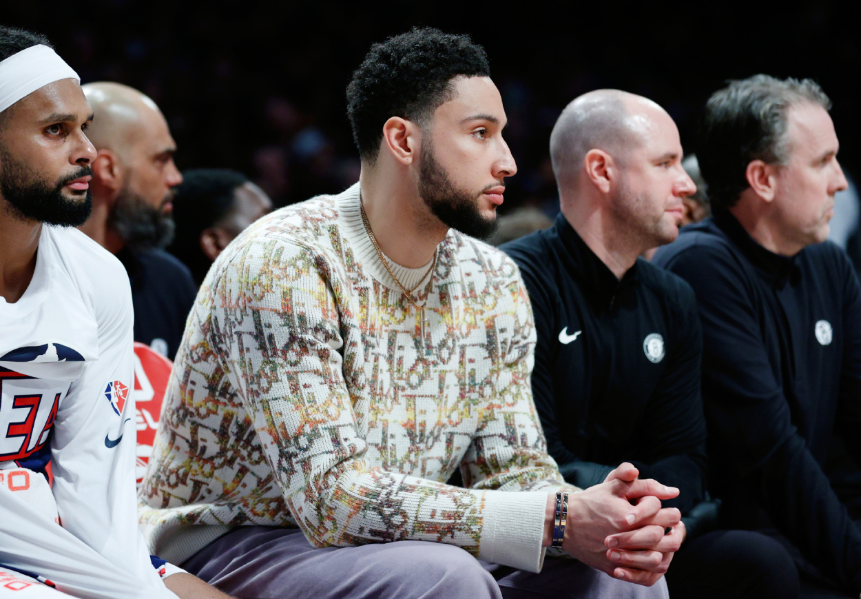 Ben Simmons of the Brooklyn Nets looks on from the bench.